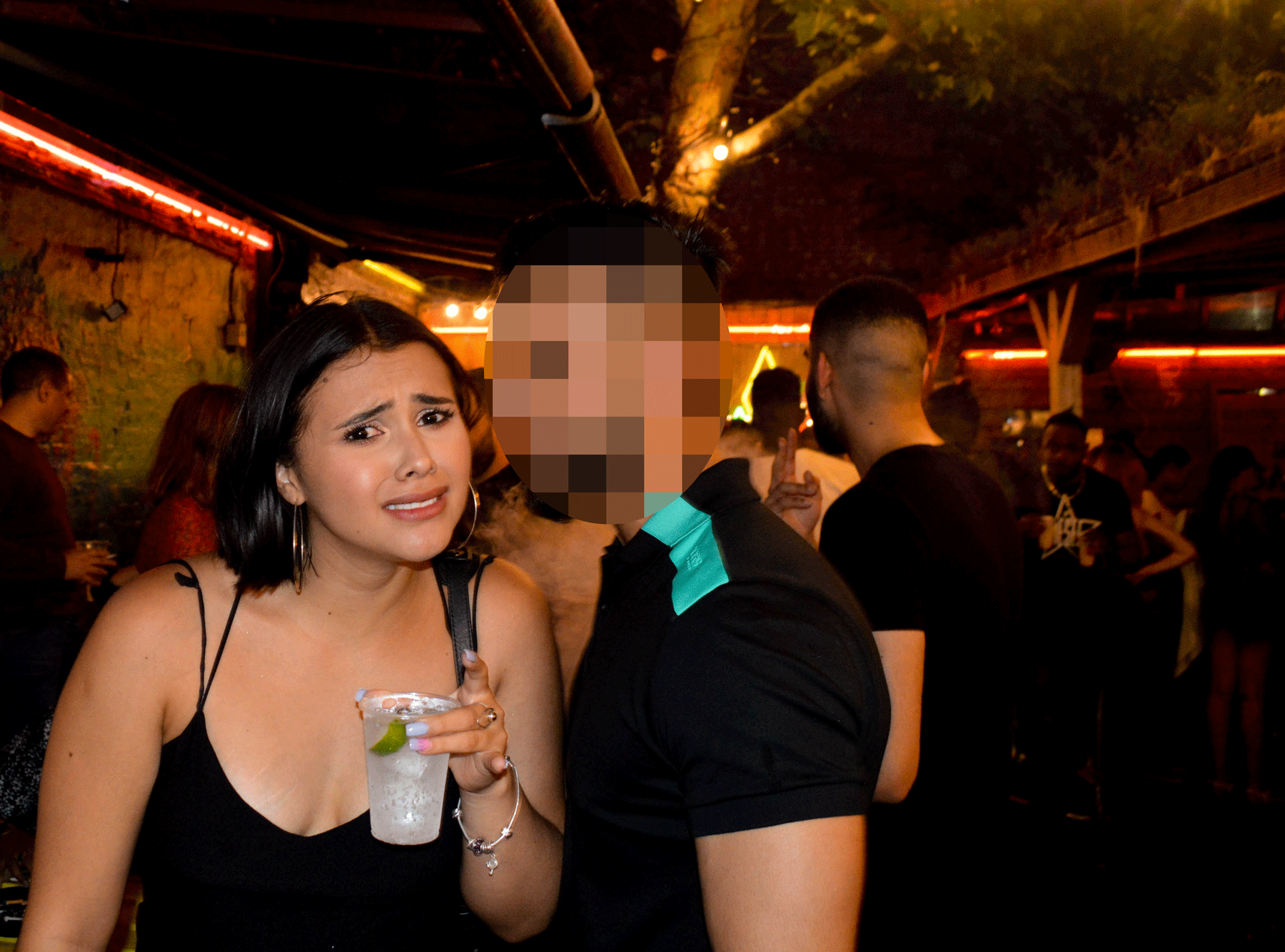 guy talking to unimpressed girl club