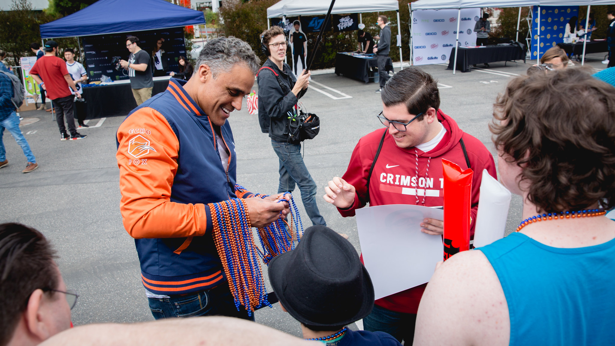 Rick Fox signs fan autographs outside the LCS studio