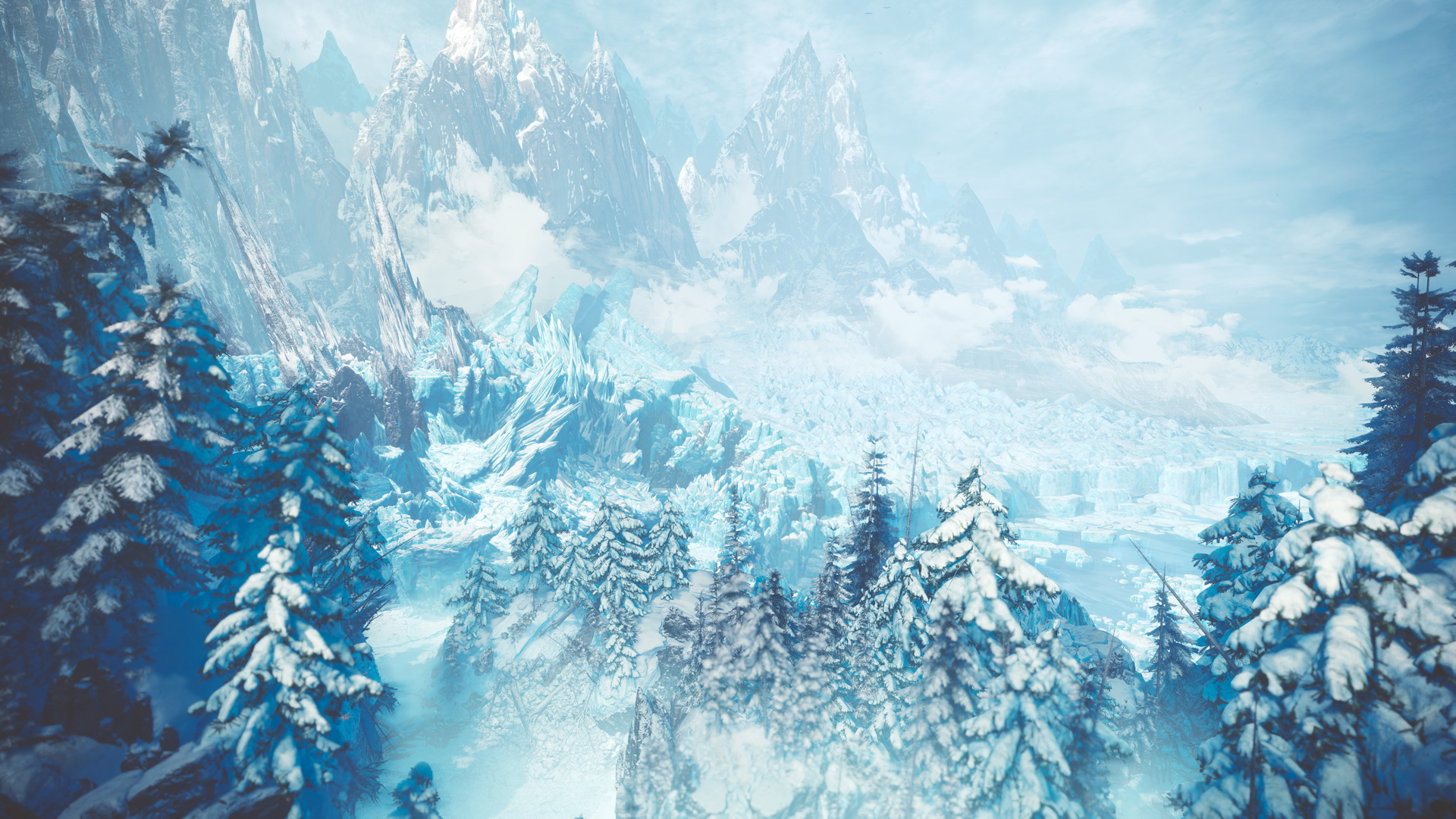 Screenshot from Monster Hunter World: Iceborne. An arial view of the Hoarfrost Reach, the new snowy climate area in this expansion. A snow covered forest sits nestled up to a mountain made of ice.