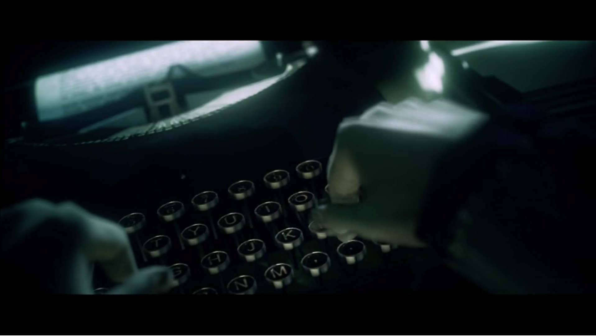 Alan Wake begins to type as he realizes it's not a lake, it's an ocean.