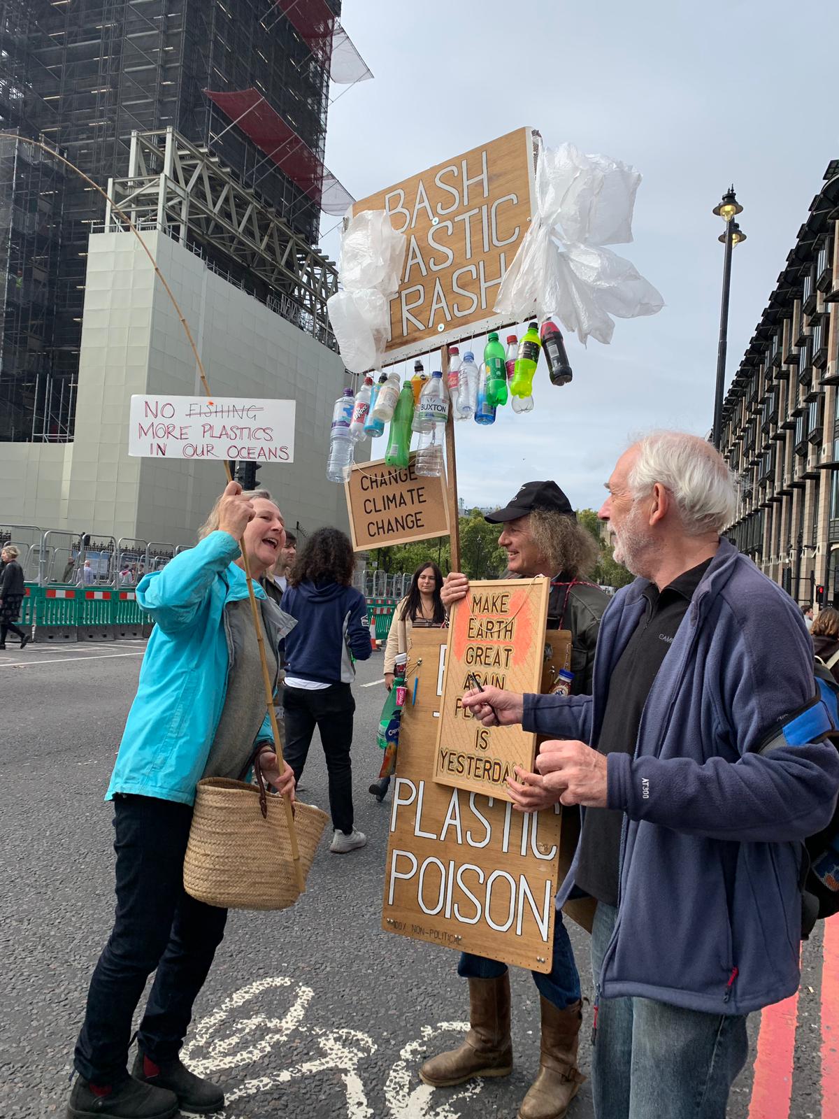 XR protestors in London with signs