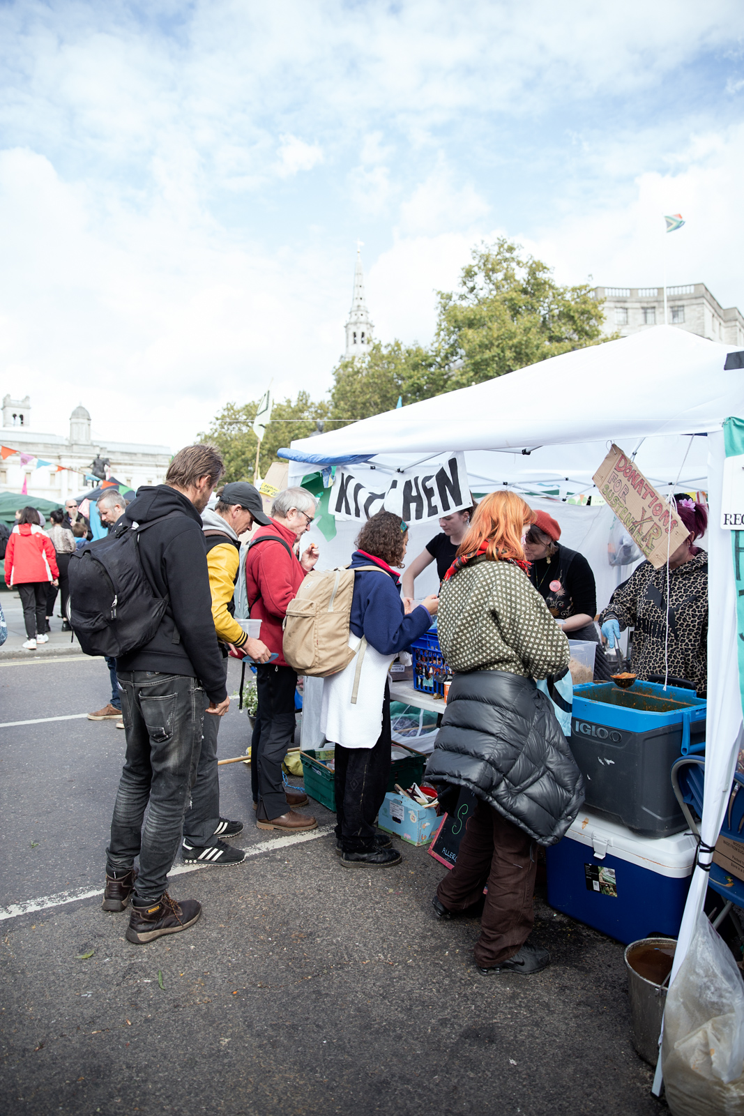 Extinction Rebellion volunteers hand out food