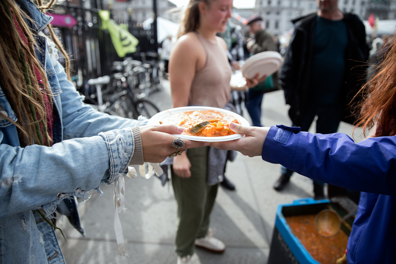 Extinction Rebellion volunteers hand out food