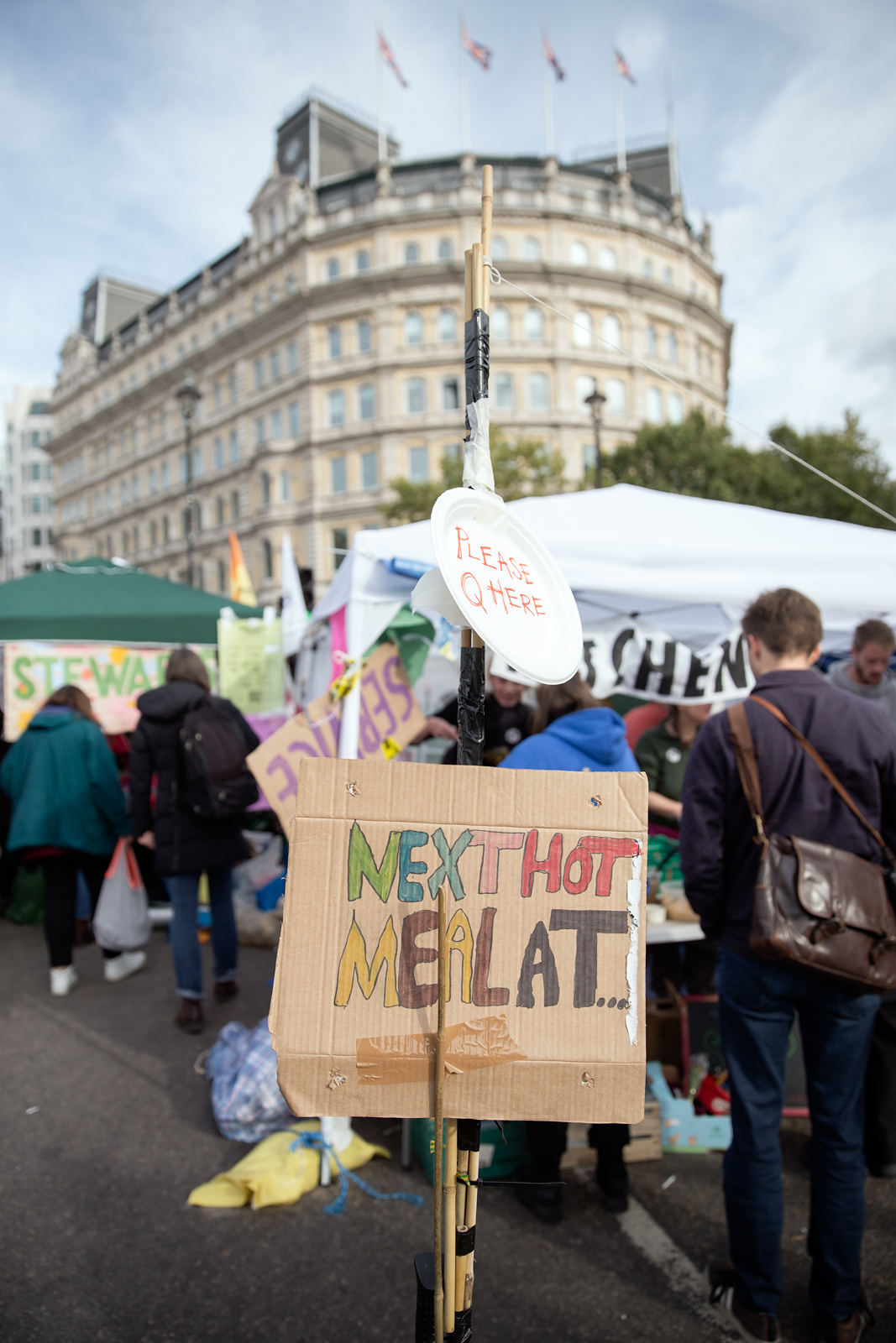 Extinction Rebellion volunteers hand out food