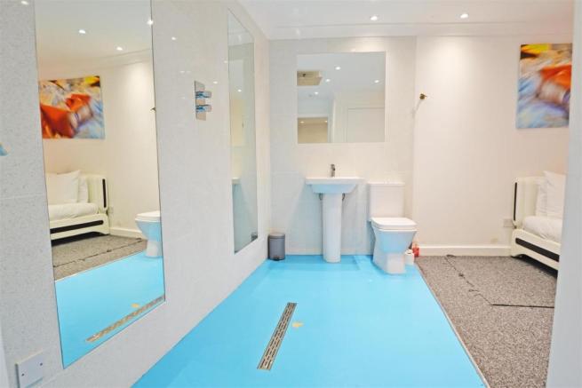 toilet next to bed