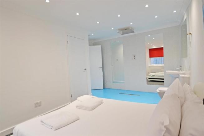 toilet next to bed