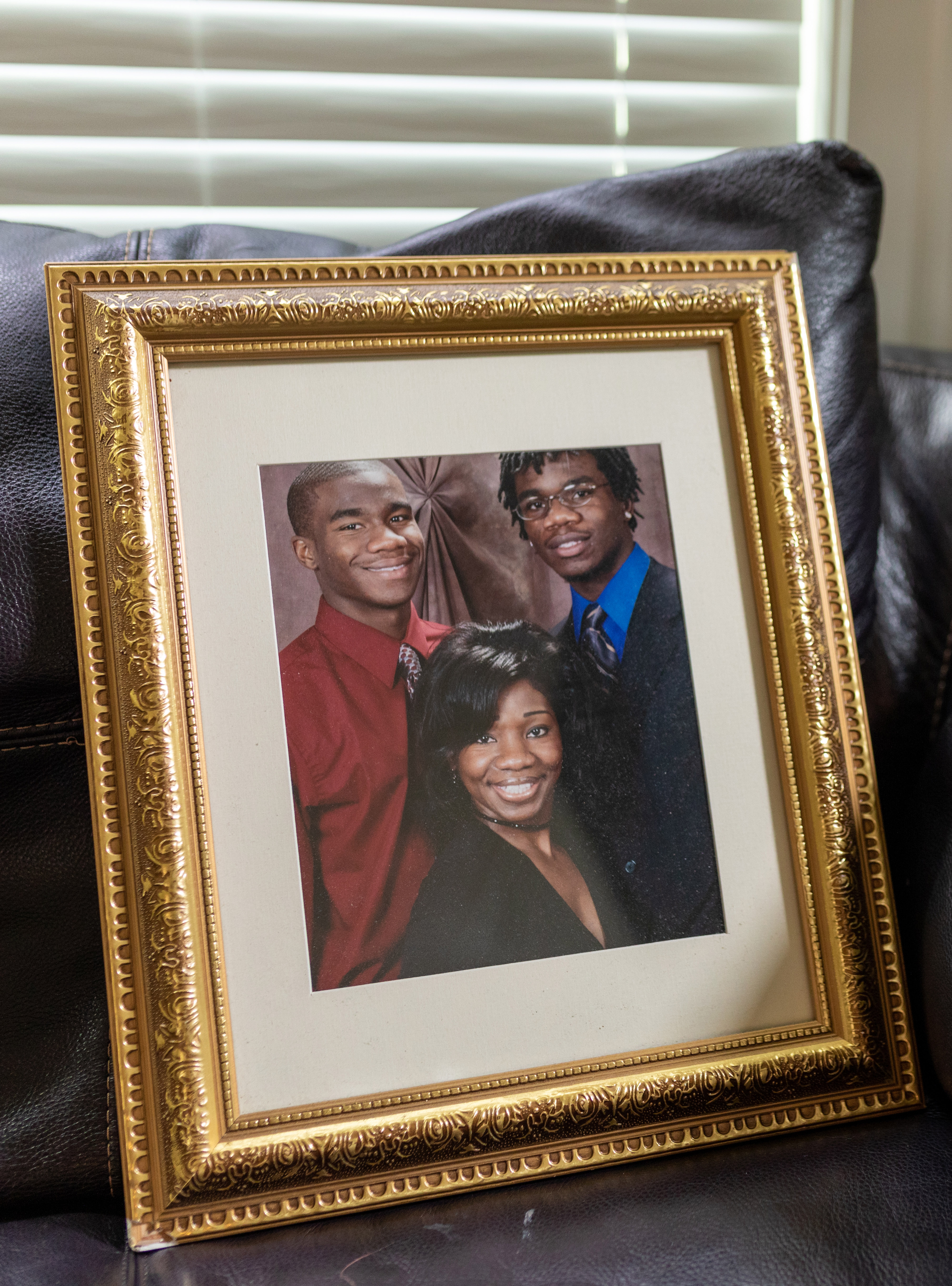 Jamarion Robinson, at left in red in a family photo