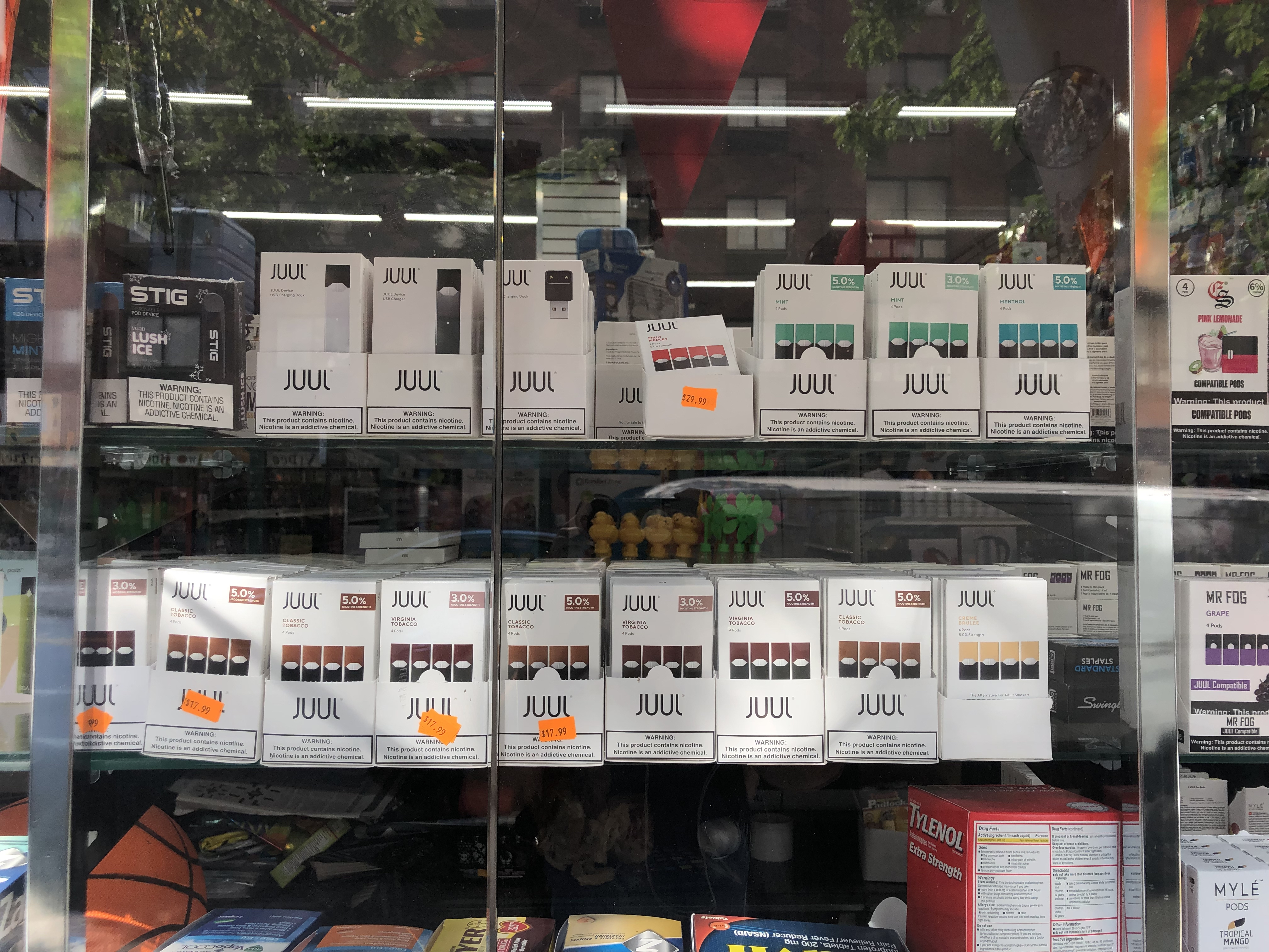 Flavored JUUL pods in a store window