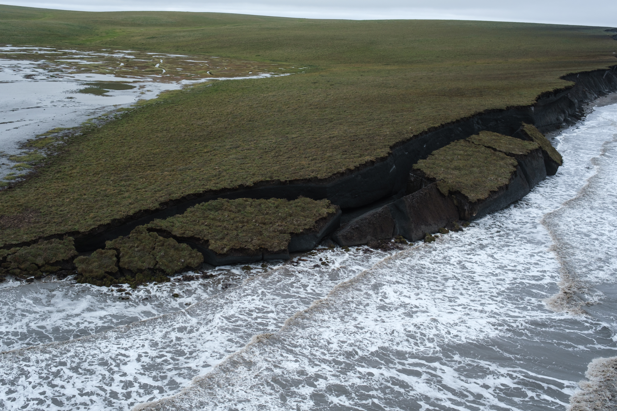 An aerial view of the eroding shore of Pelly Island.