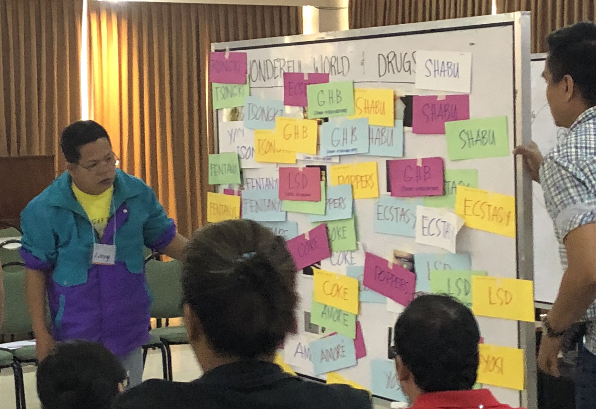 Classifying drugs at a harm reduction workshop in Manila.