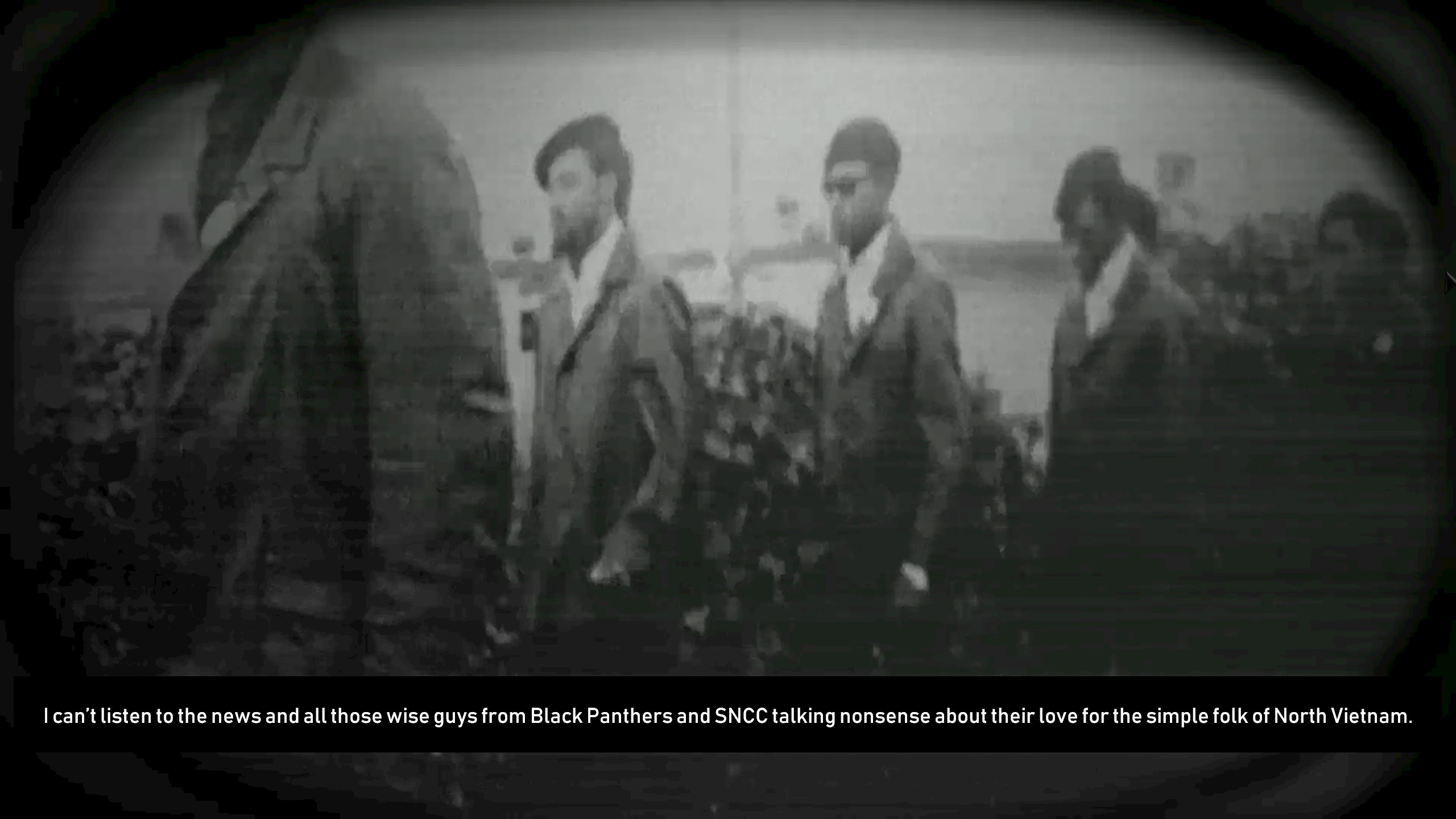 A screenshot of a cutscene from Radio Commander depicting old newsreel footage of Civil Rights activists in the 60s