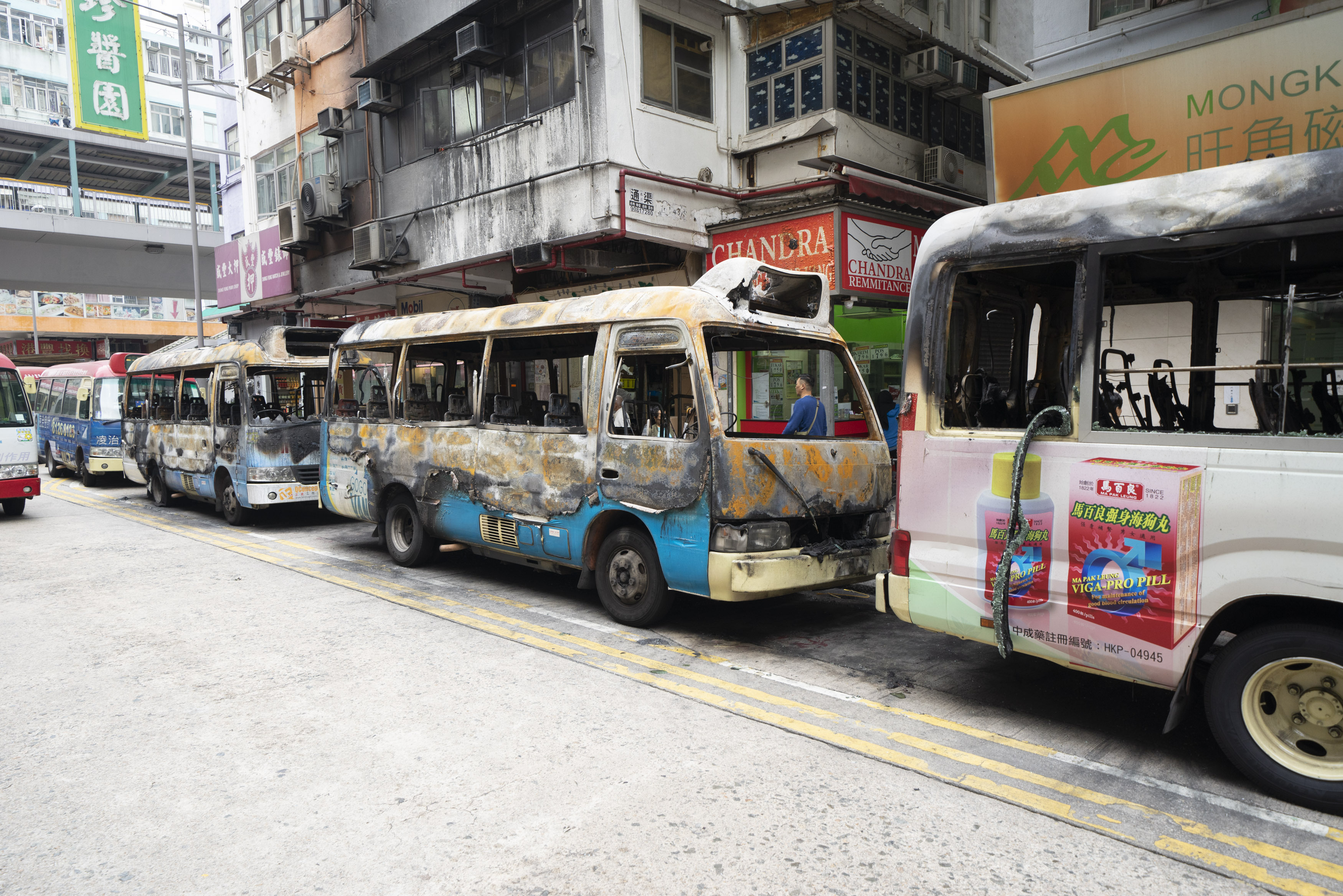 Abgebrannte Busse in Hongkong
