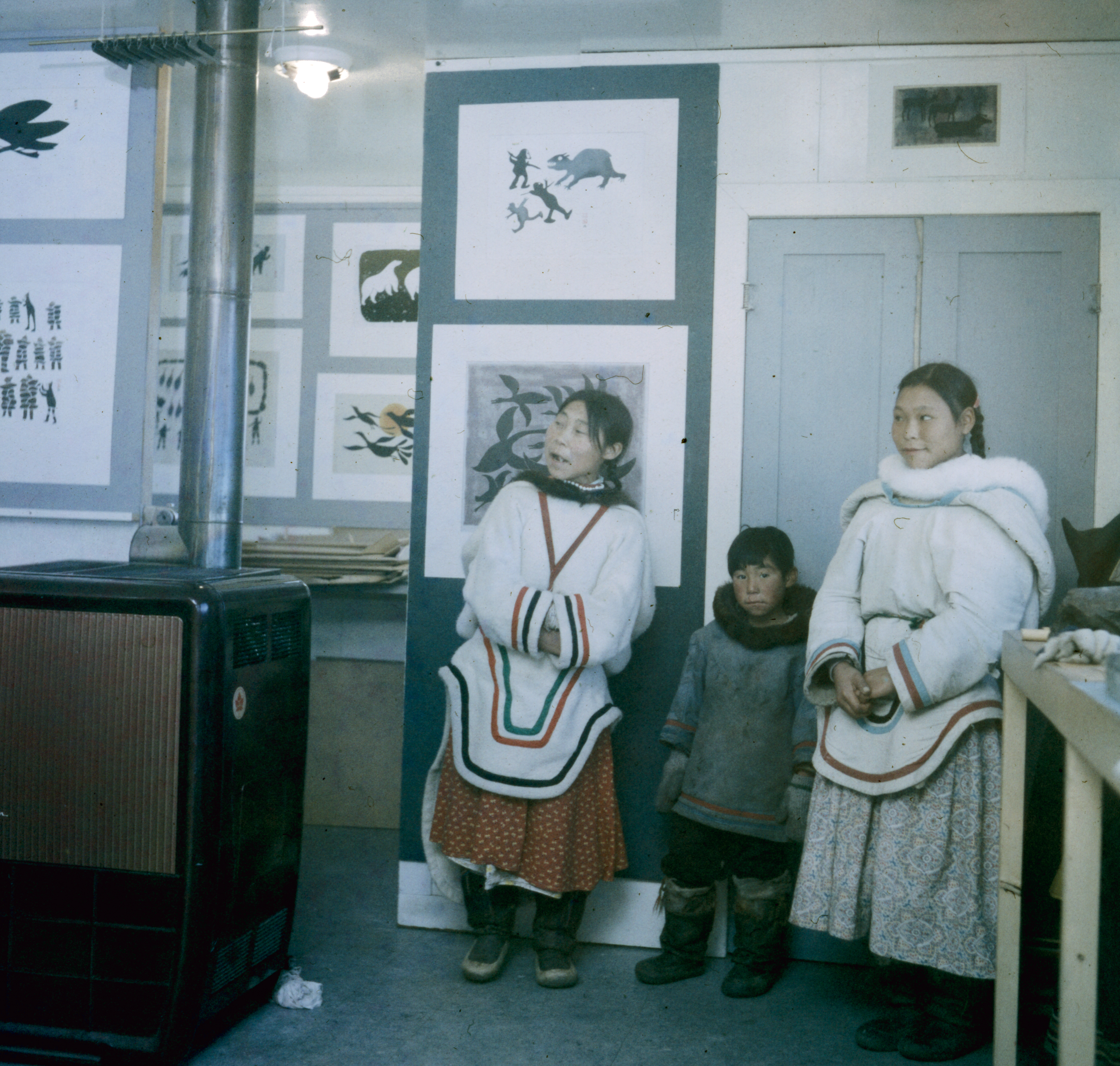 Artist Kiakshuk drawing in a tent, Cape Dorset, 1960. (Rosemary Eaton) © Libraries and Archives Canada