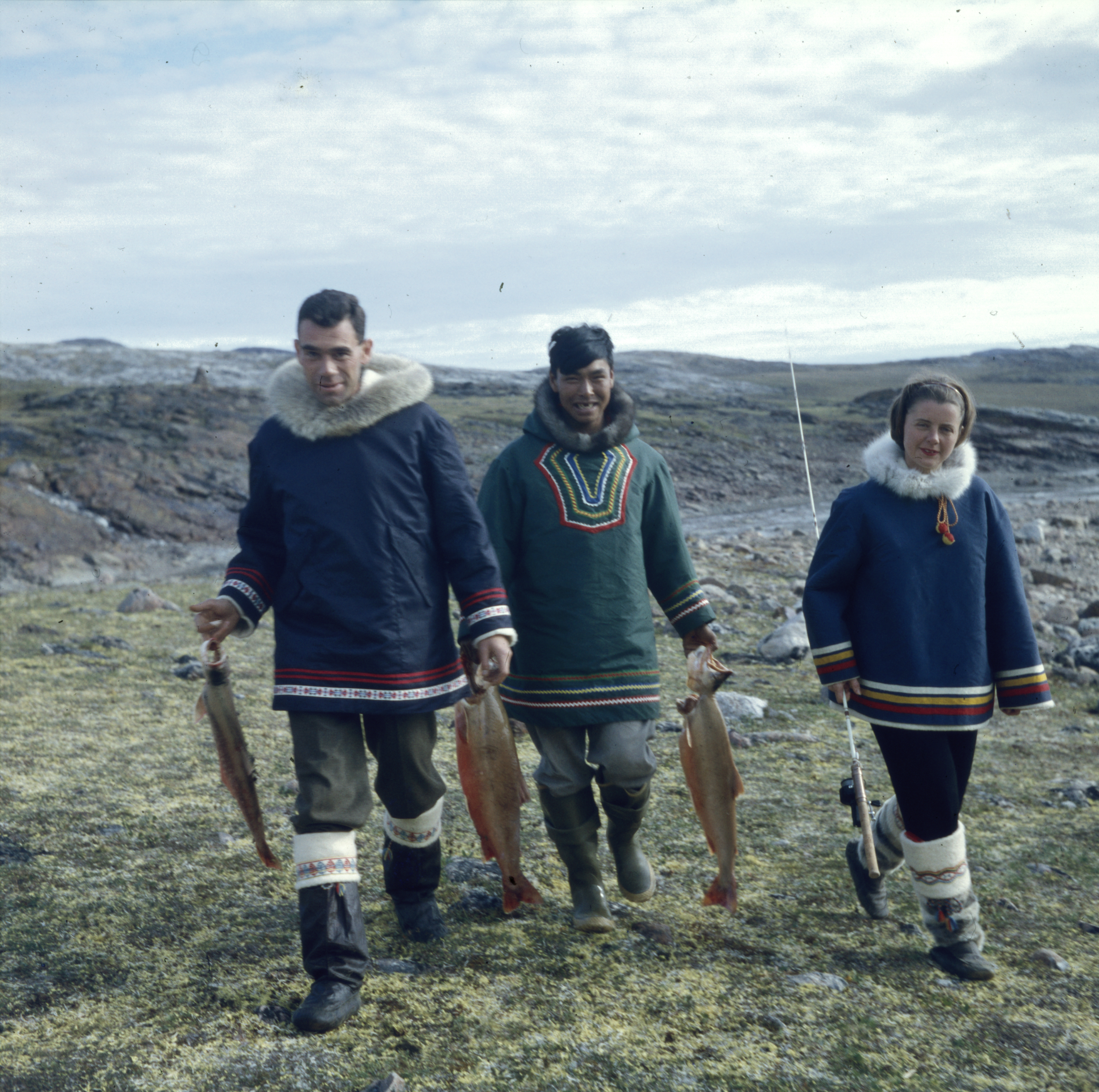 James Houston (left) with Kananginak Pootoogook and an unknown woman, Cape Dorset, 1958. (Rosemary Eaton) © Libraries and Archives Canada