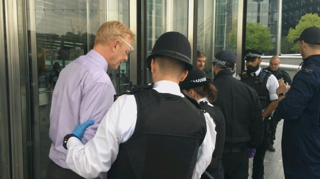 Extinction Rebellion activist Andrew Medhurst getting arrested