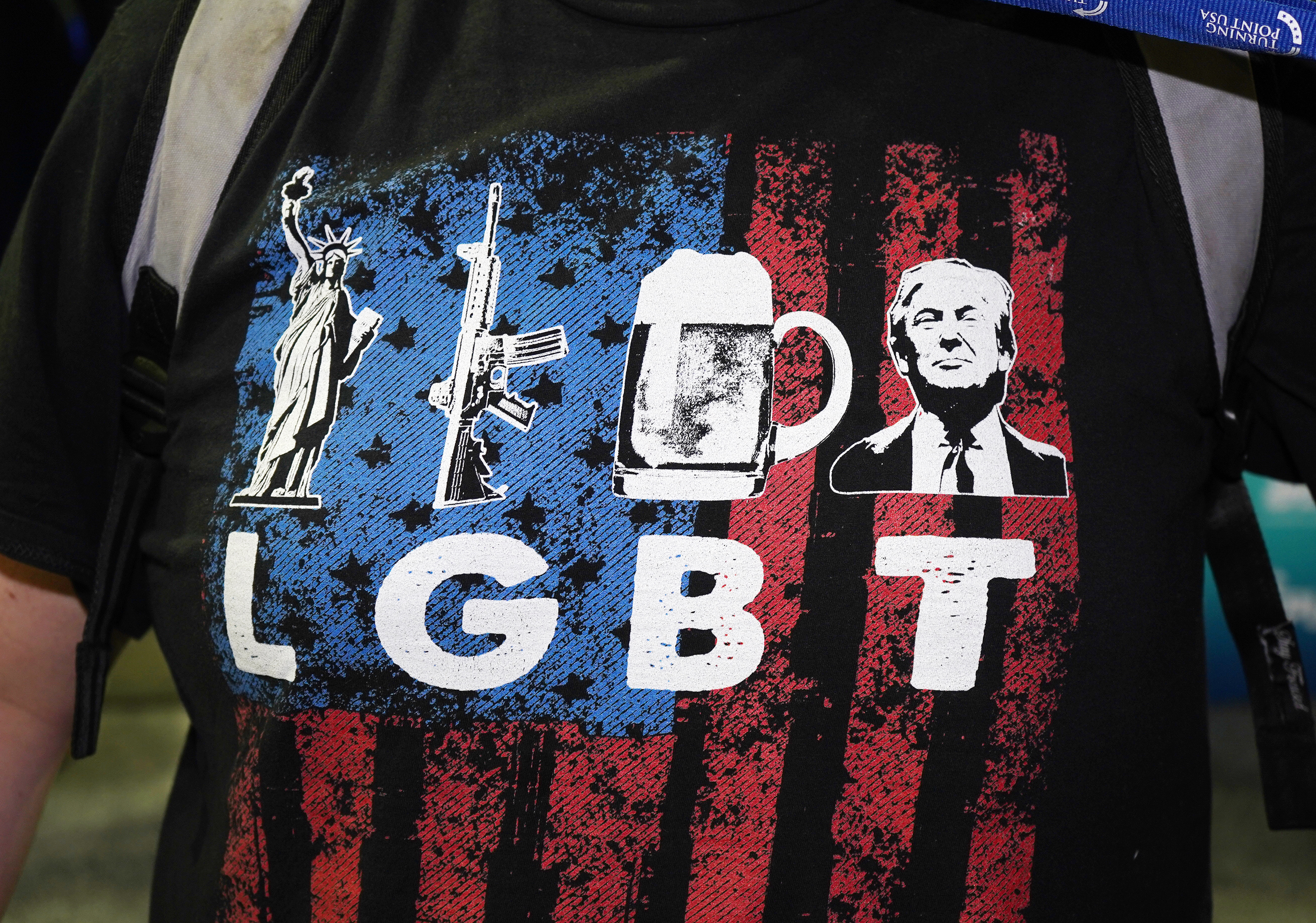 a shirt that features Trump, a beer, and 