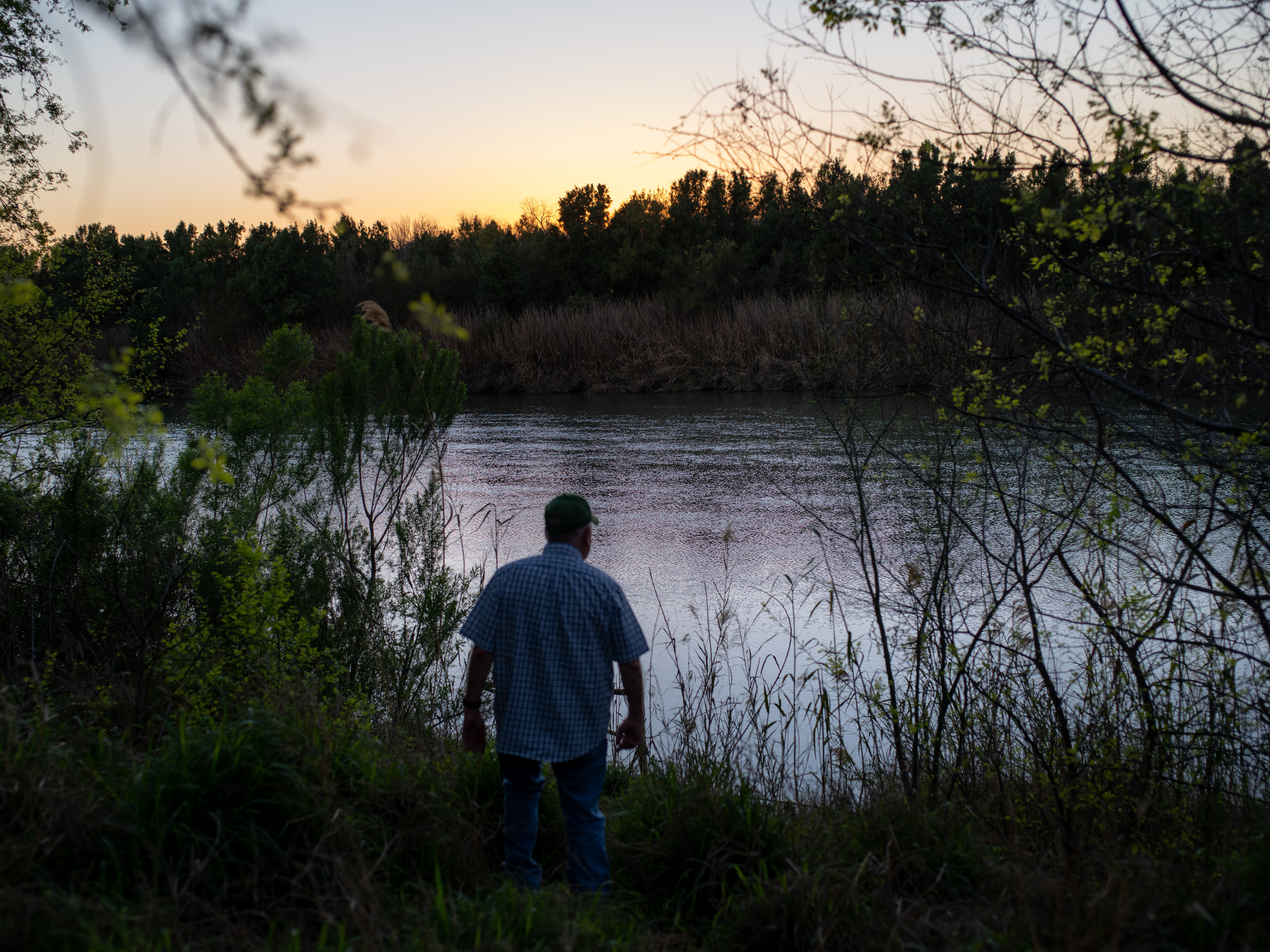 A rancher on the bank of the Rio Grande. Image: Bloomberg/Getty