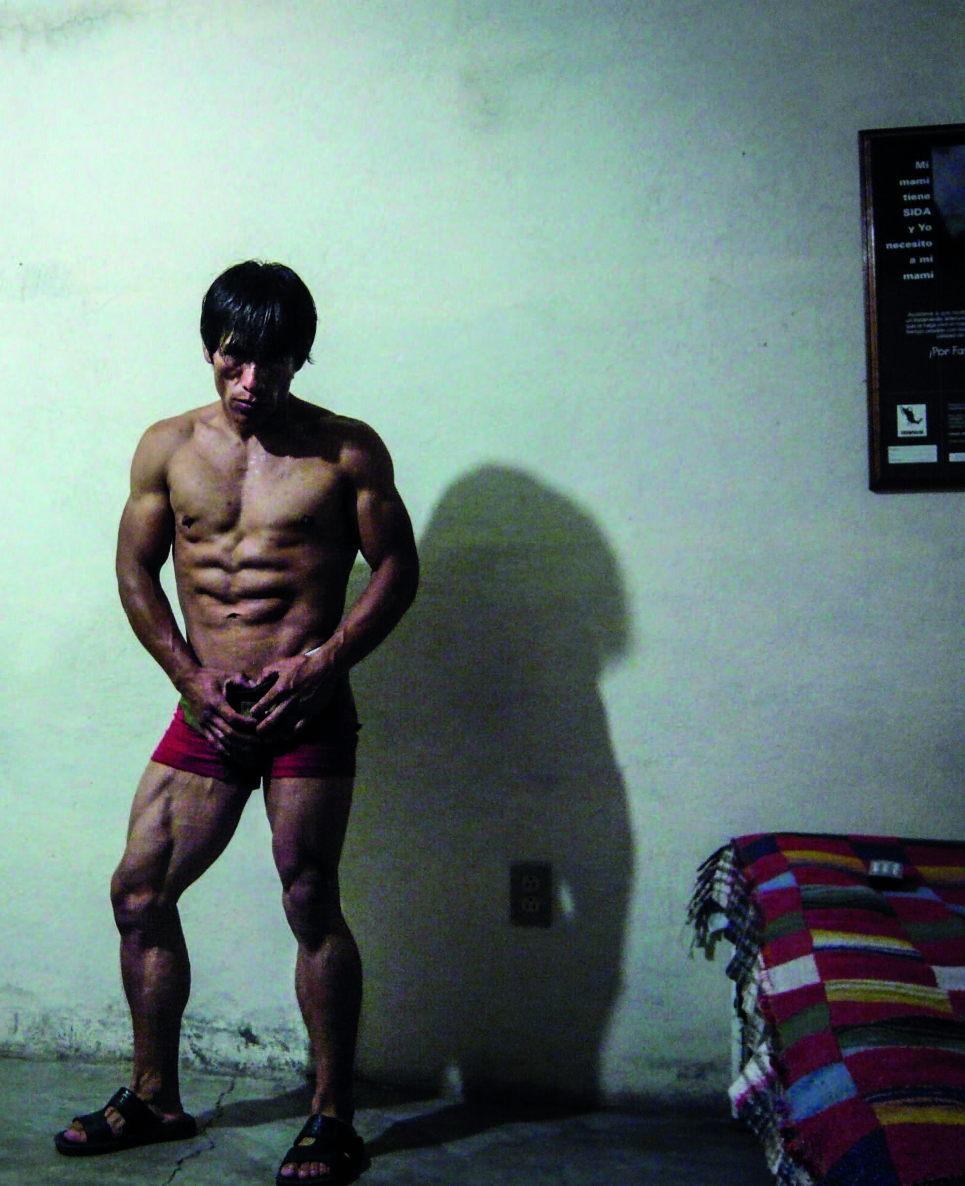 A man with muscles suffering from HIV from Through Positive Eyes