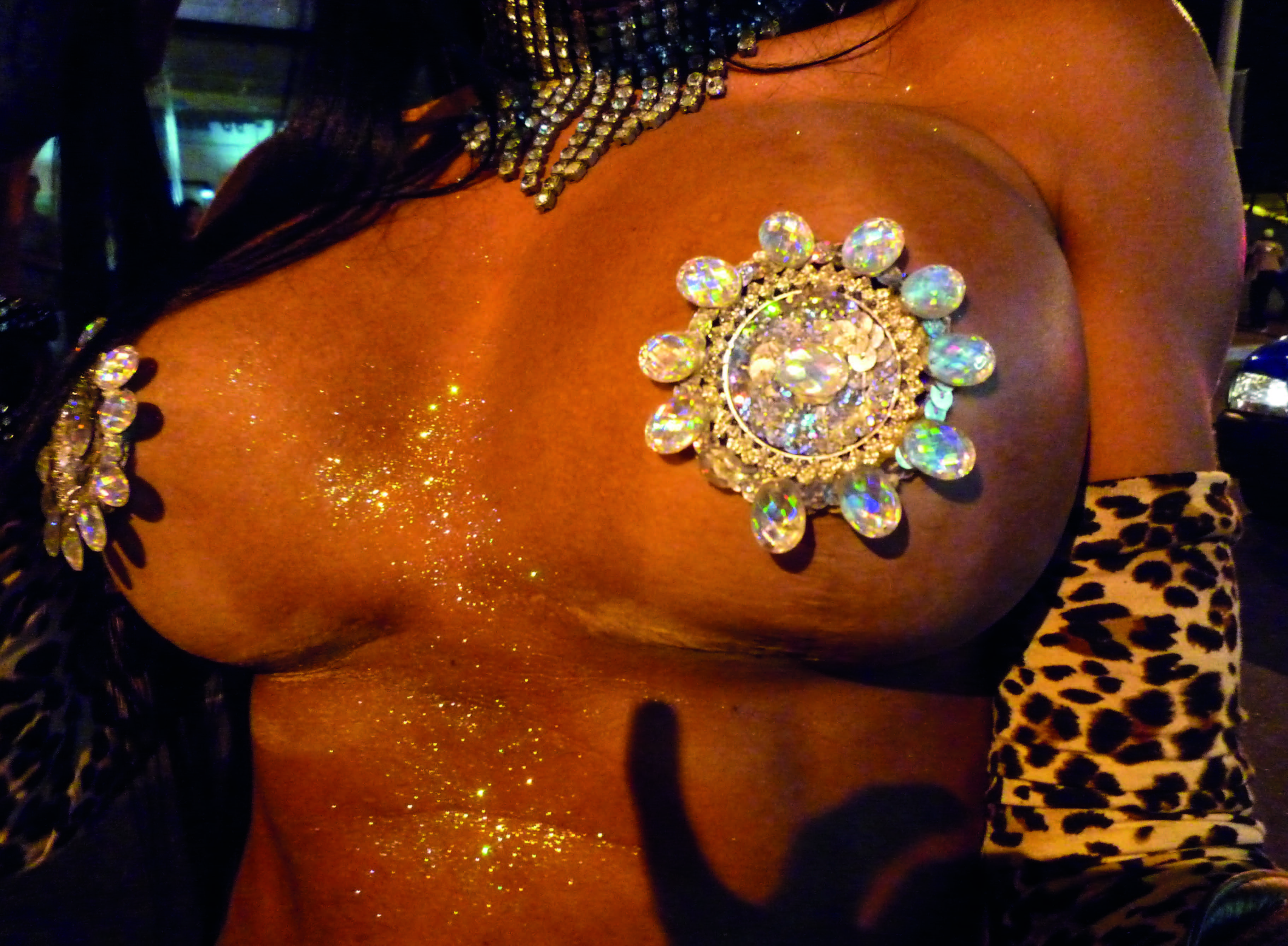 A dancer with bejewelled nipple pasties suffering from HIV from Through Positive Eyes