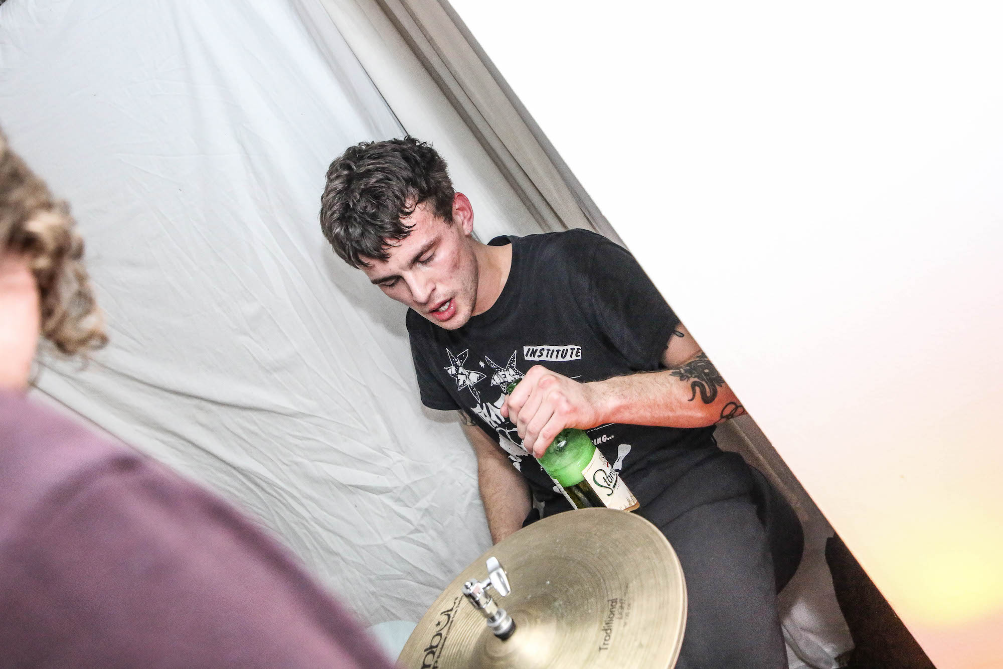 drummer drinking beer