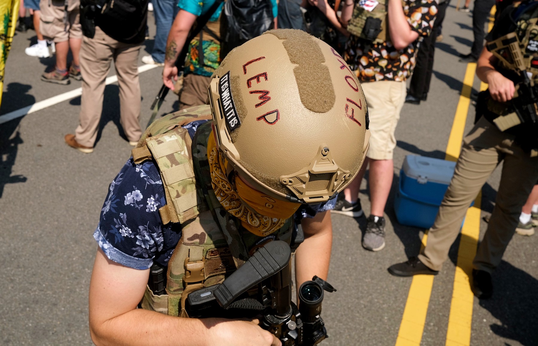 Duncan Lemp was killed by Maryland police in a no-knock raid in March, and has since become a martyr in Boogaloo circles. Here his name is written on a Boogaloo Boi's helmet in Richmond. 