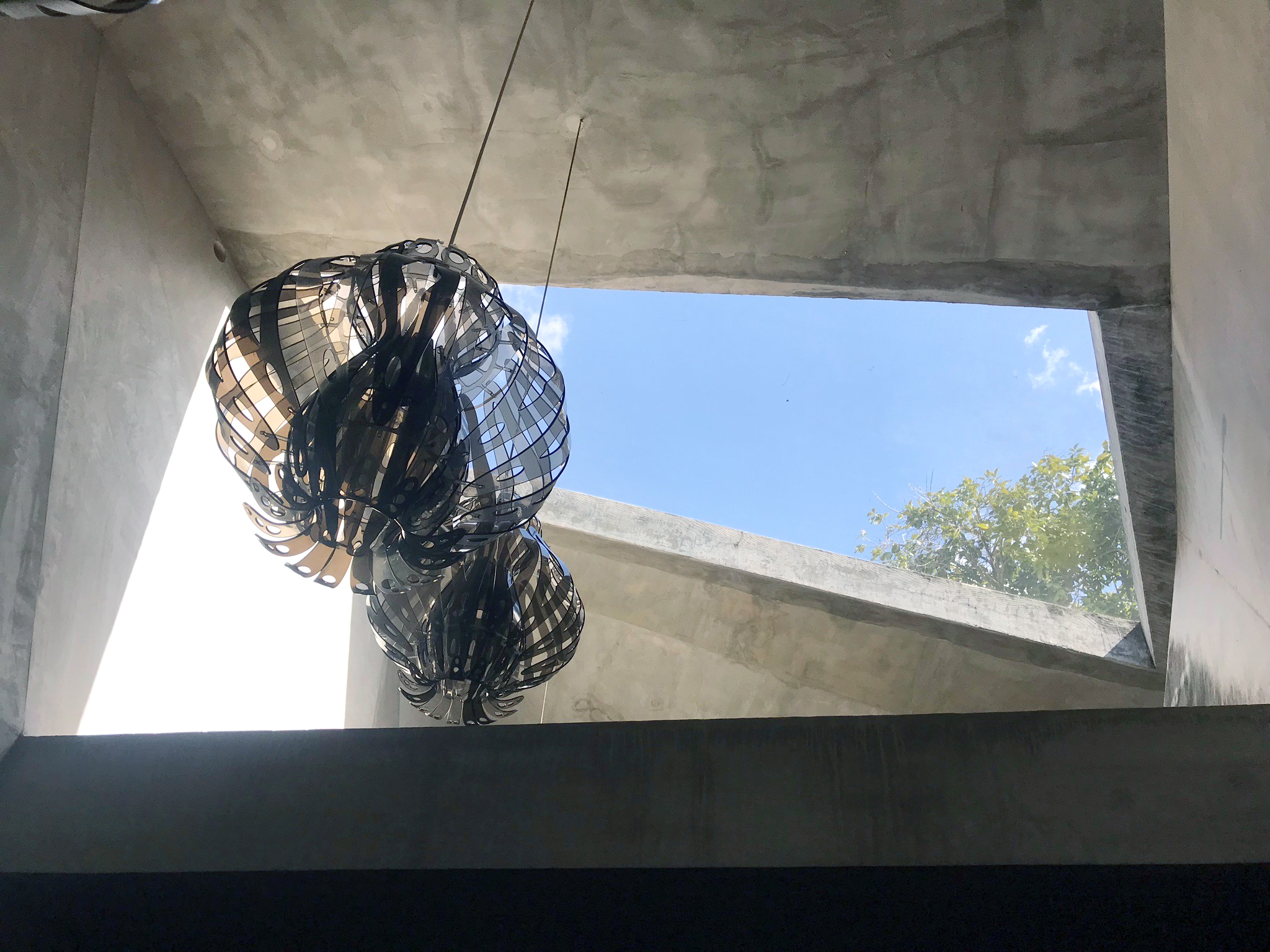 A view of Pardo lamps looking through a skylight in the Tabernacle, Courtesy of Petzel, New York.jpg
