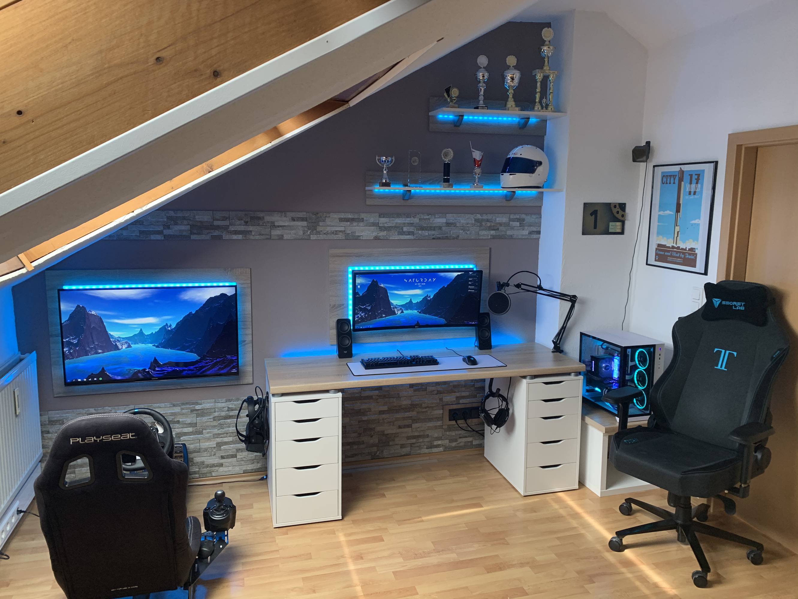 An LED-lit, racing themed gaming space tucked into a handsome attic or loft-style room.