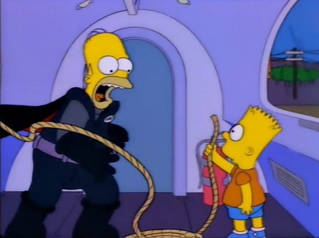 Homer als Einschienenbahnfahrer schreit entsetzt im Führerhaus, weil er sieht, dass er das Seil, mit dem er die Bahn stoppen will, nicht festgemacht hat