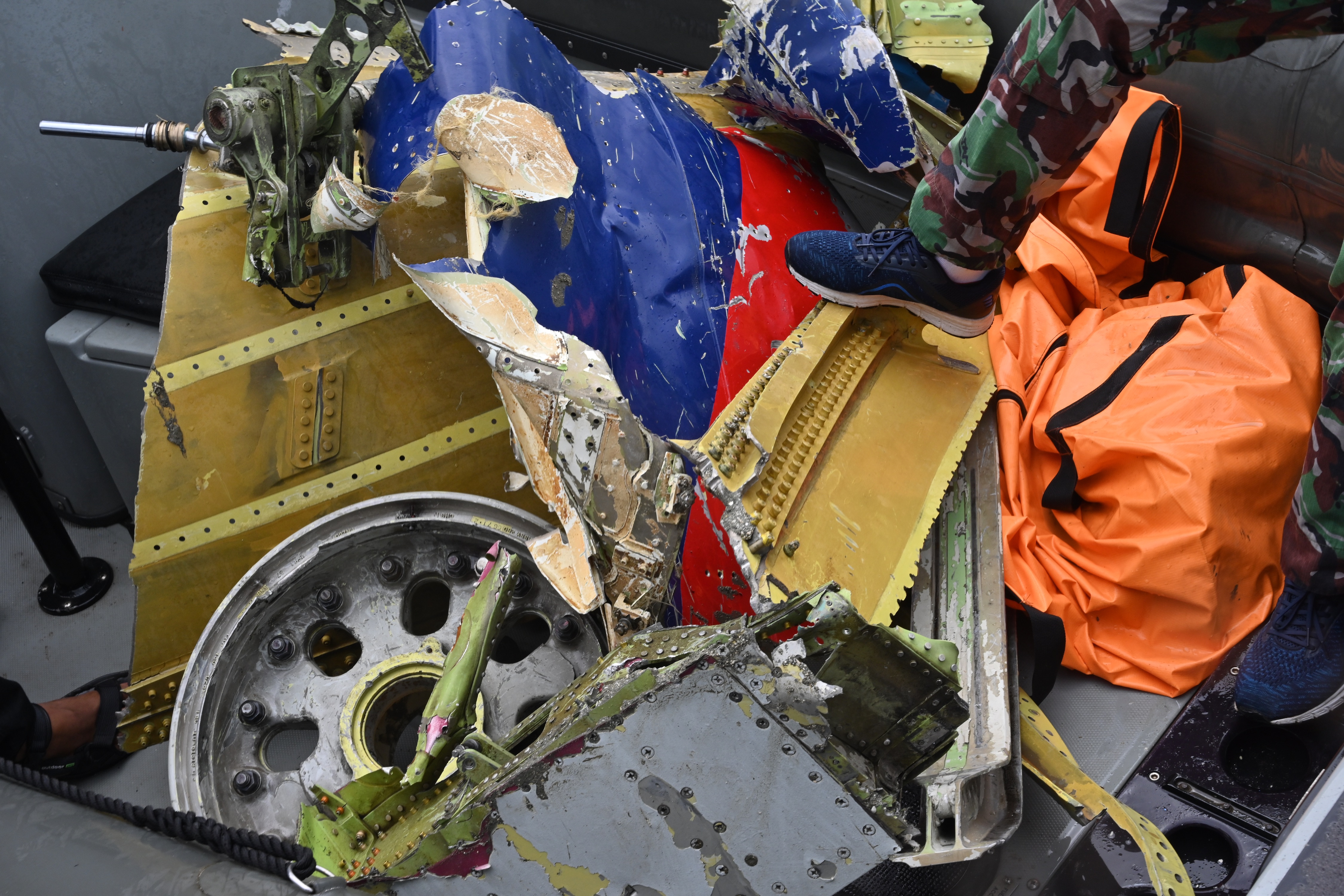Retrieved wreckage from the ill-fated Sriwijaya Air Boeing 737-500 aircraft. (AFP PHOTO BY ADEK BERRY)