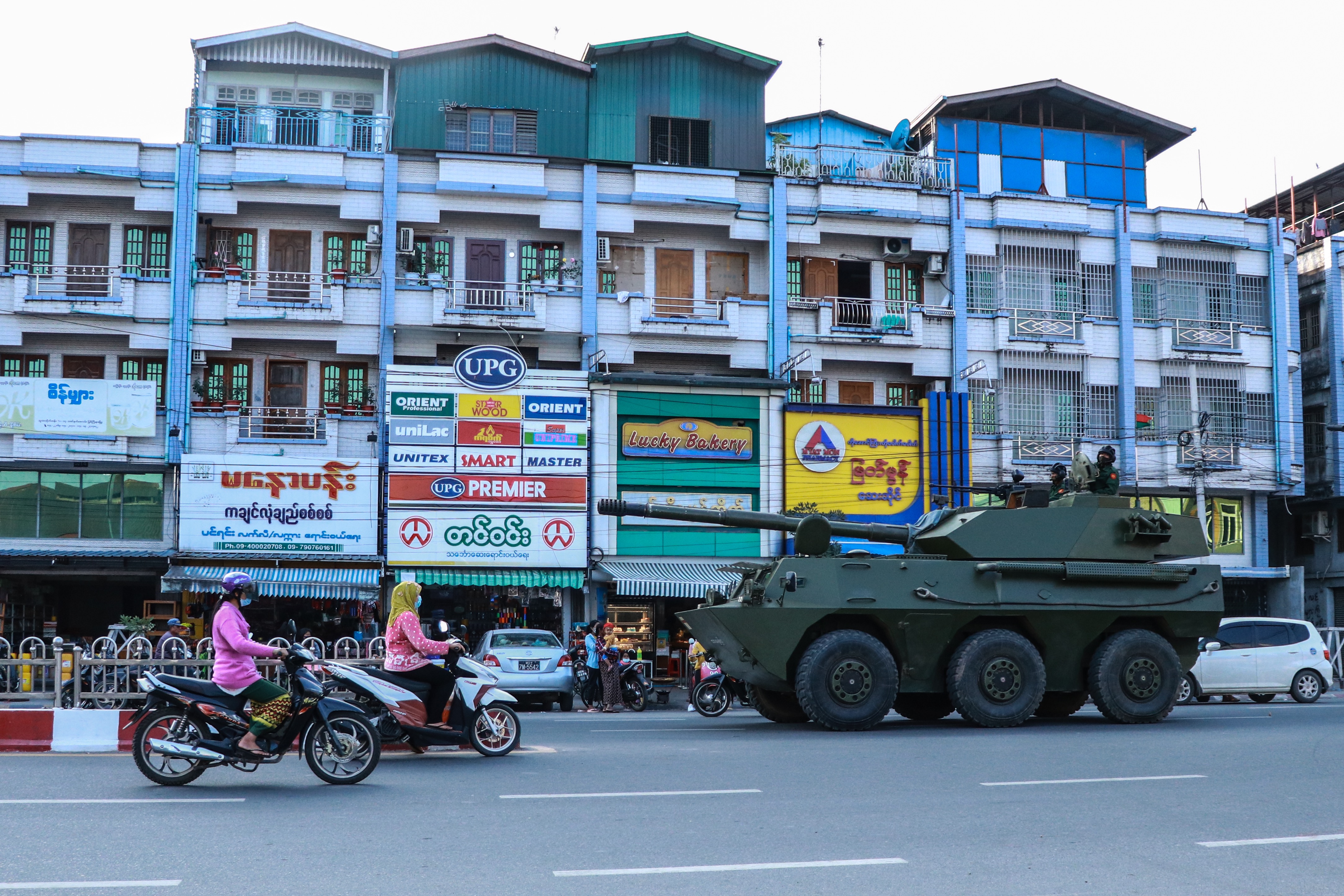 A military armoured vehicle is seen along the street. PHOTO: AFP / STRINGER