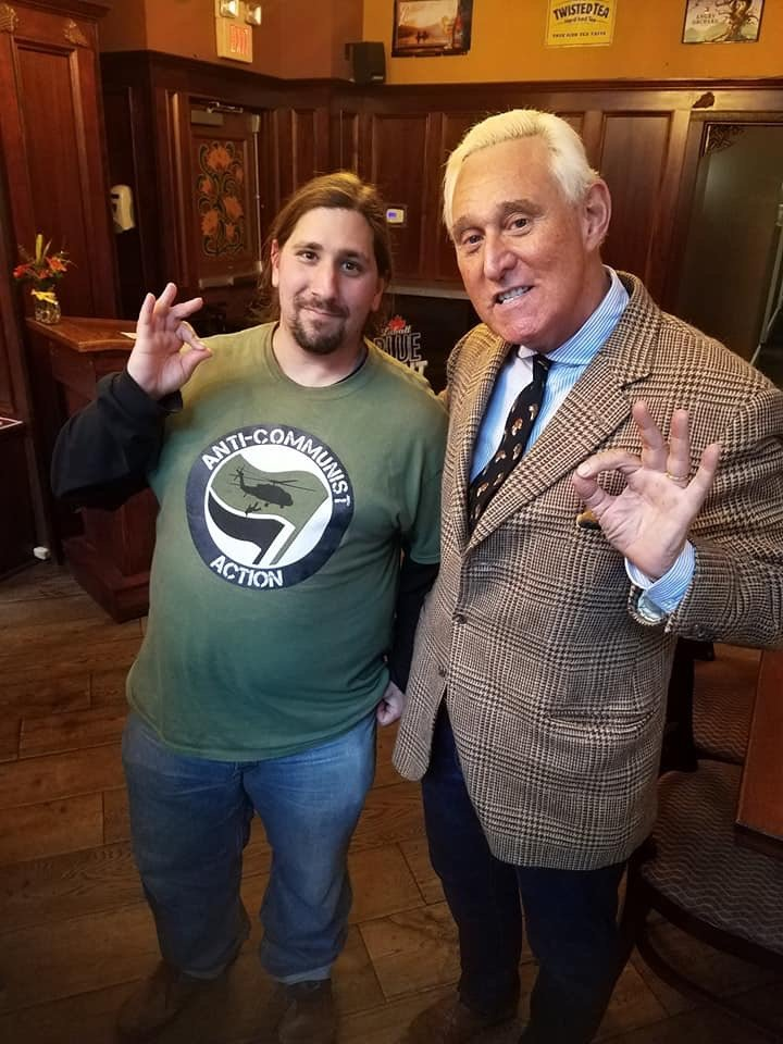 Gabriel Brown and Roger Stone flashing the 