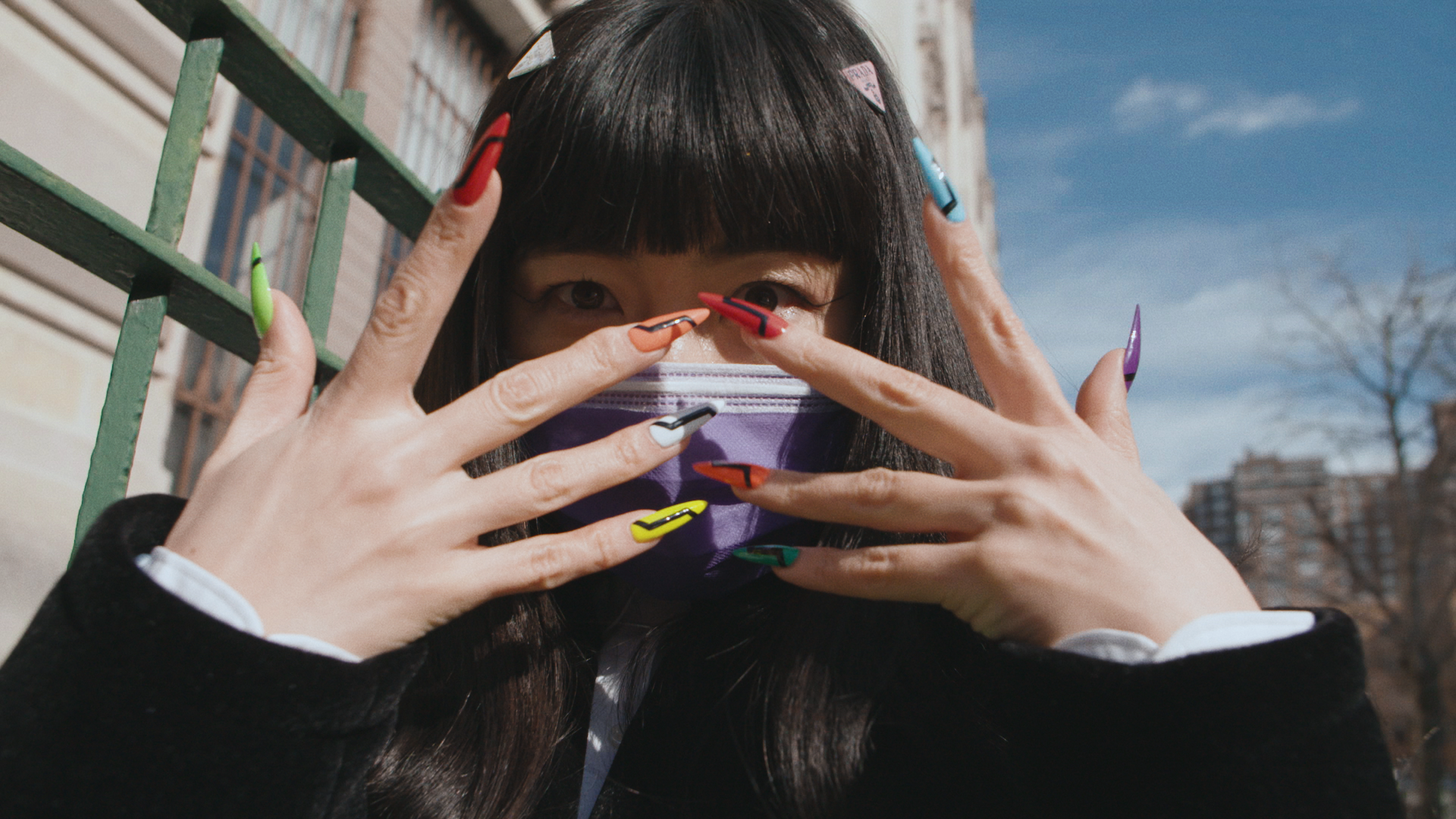 still from i-D short film glam squad. image of Mei and her nails.