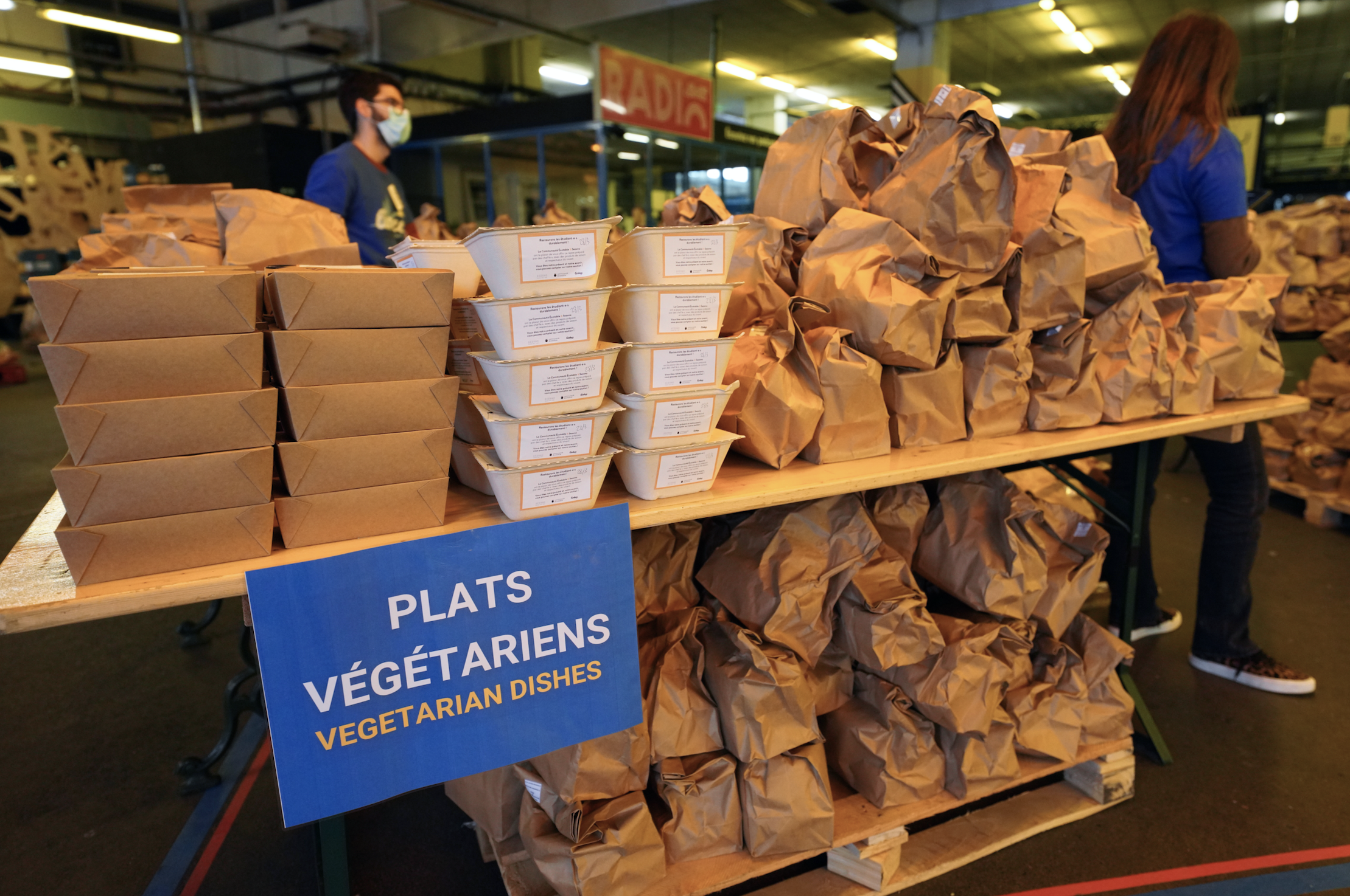 Bags of foods on tables