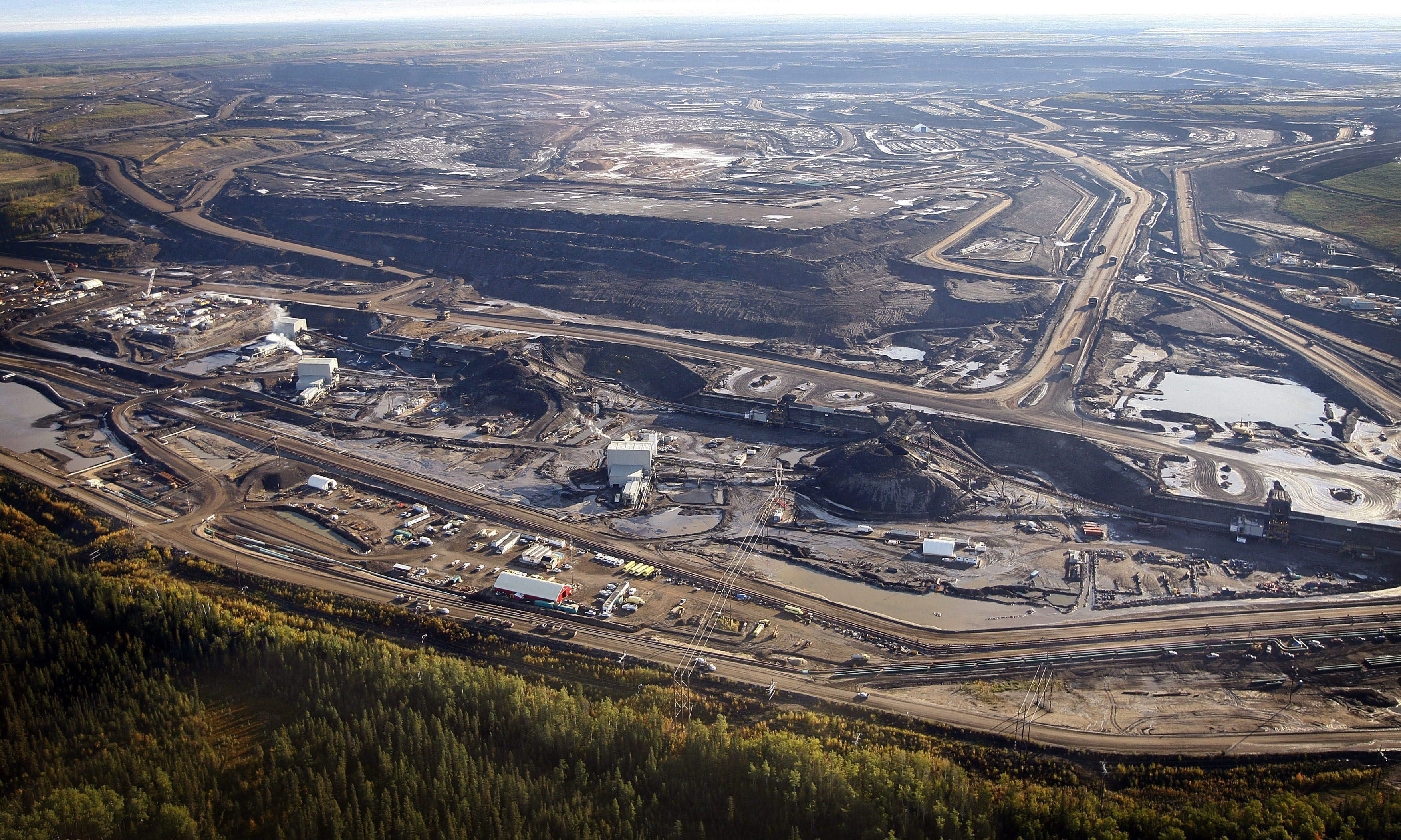 Good money comes at a cost to the land. A tar sands mine facility near Fort McMurray, Alberta.