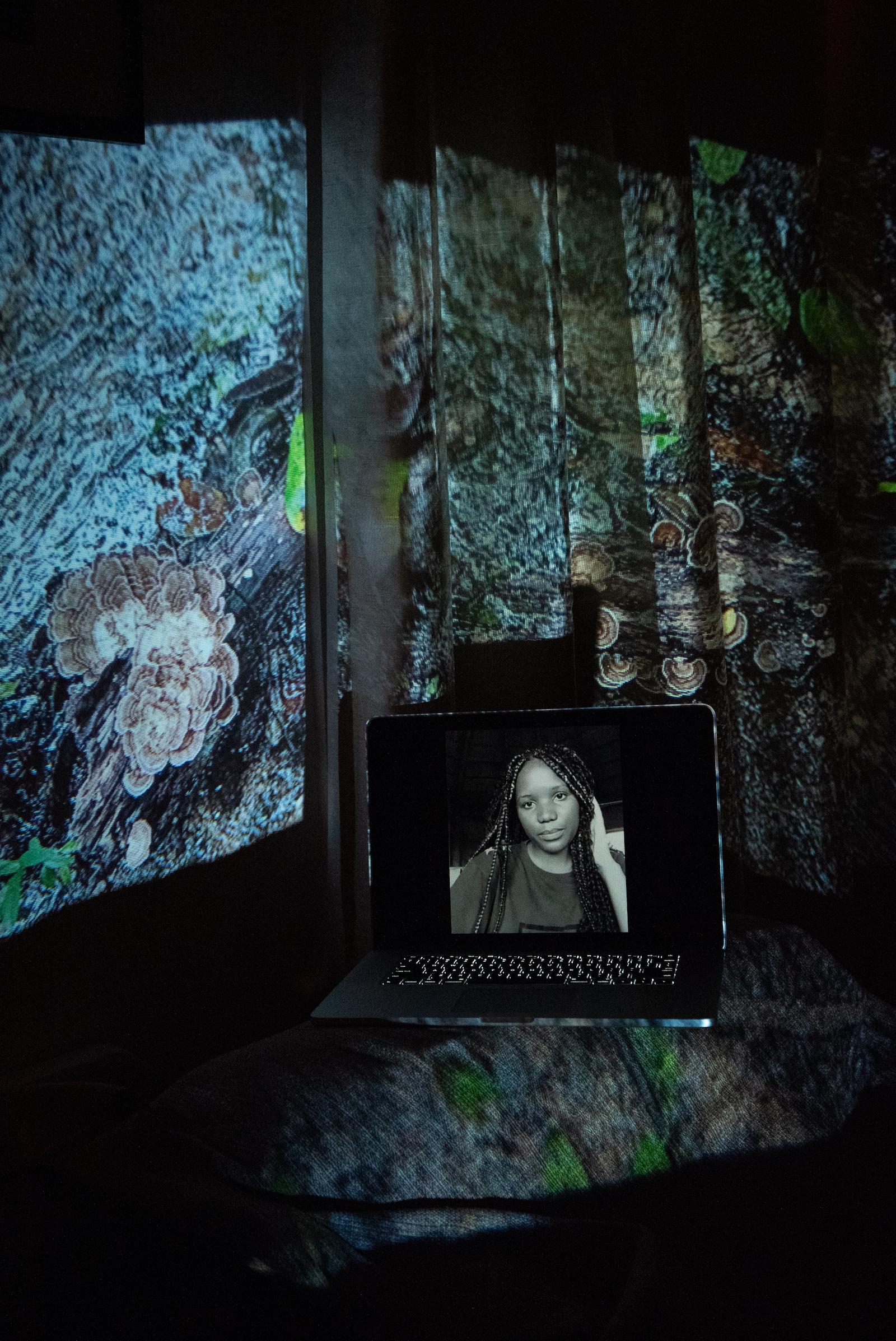 Veronica Mulenga, Youth Climate Save Zambia Organizer. Projected Image: En en el Arroyo, Lacandon Jungle, Mexico, December 2020.