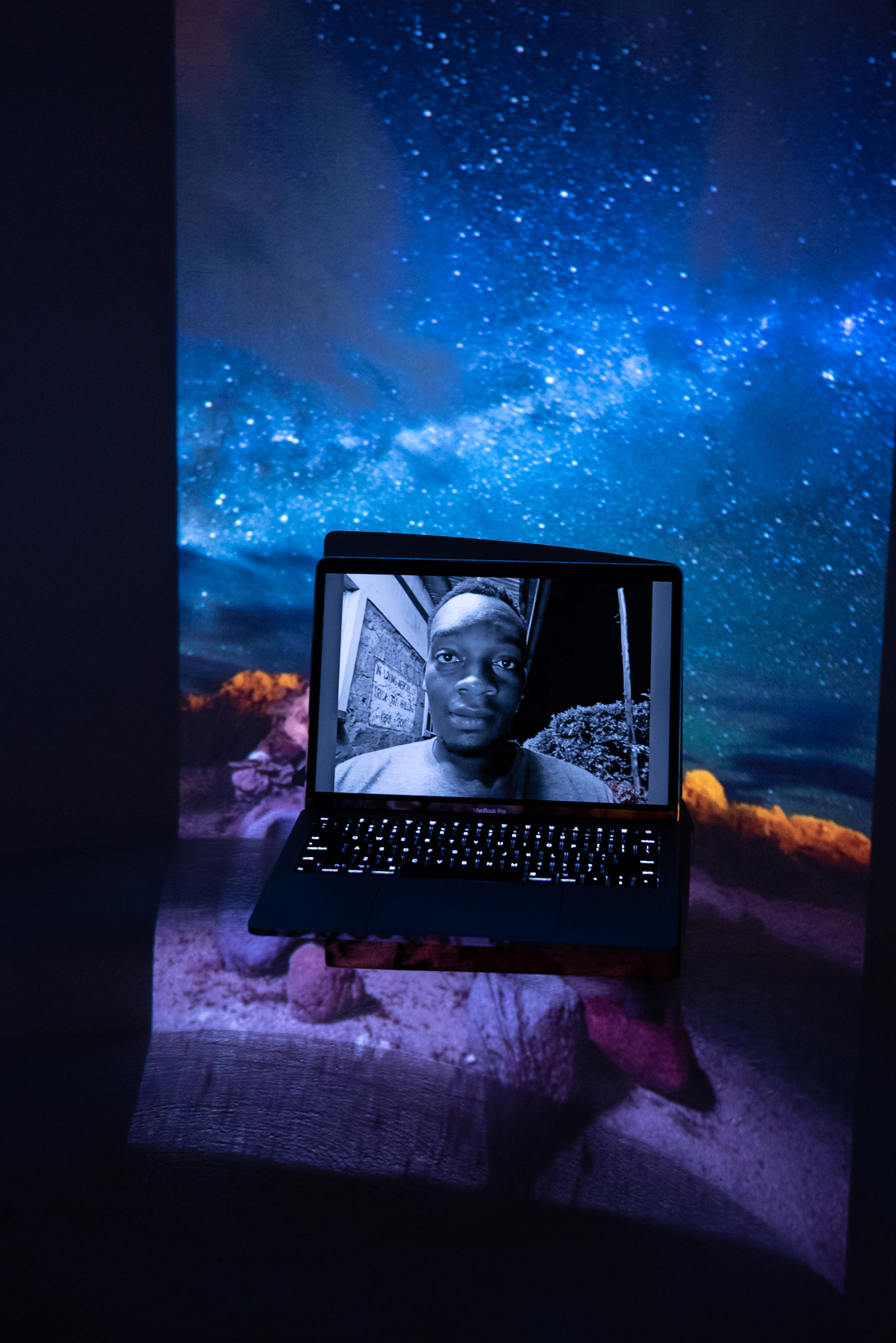 Kevin Mtai, MockCOP26 Event Coordinator, Earth Uprising Regional Coordinator, Co-Founder of KEAN network, Member of GCC. Projected Image: Las Estrellas del Pasado, Uyuni, Bolivia, March 2019.