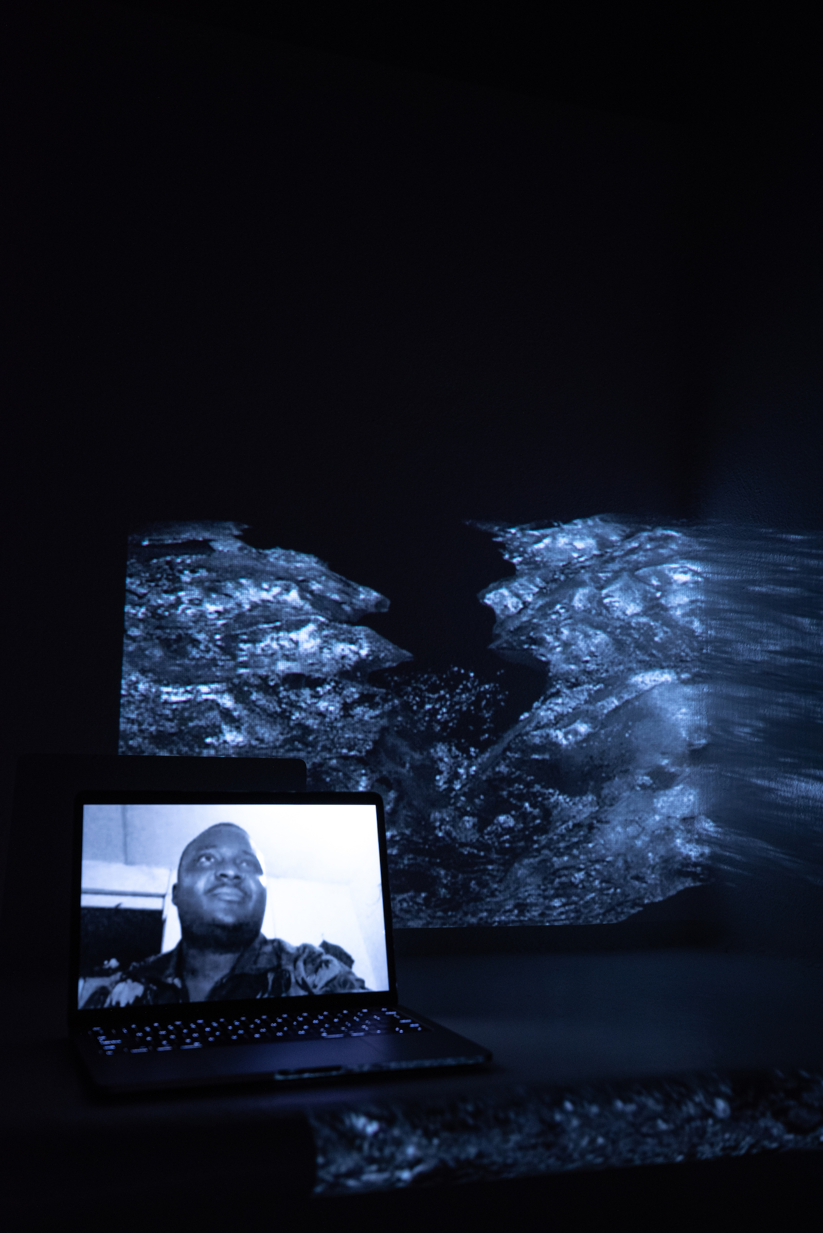 Derrick K.E. Nyamedi, Fridays for Future Accra Organizer, Climate Live Coordinator. Projected Image: Melting Glacier, Gobi Desert, Mongolia, August 2019.