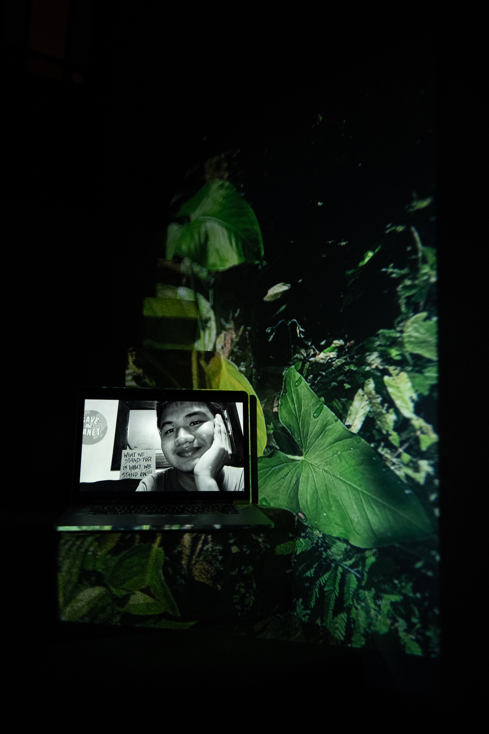 Vhon Michael Tobes, Award-Winning Queer Activist, Founder, and Director of Zero Hour SE Asia. Projected Image: En la Selva, Lacandon Jungle, Mexico, December 2020.