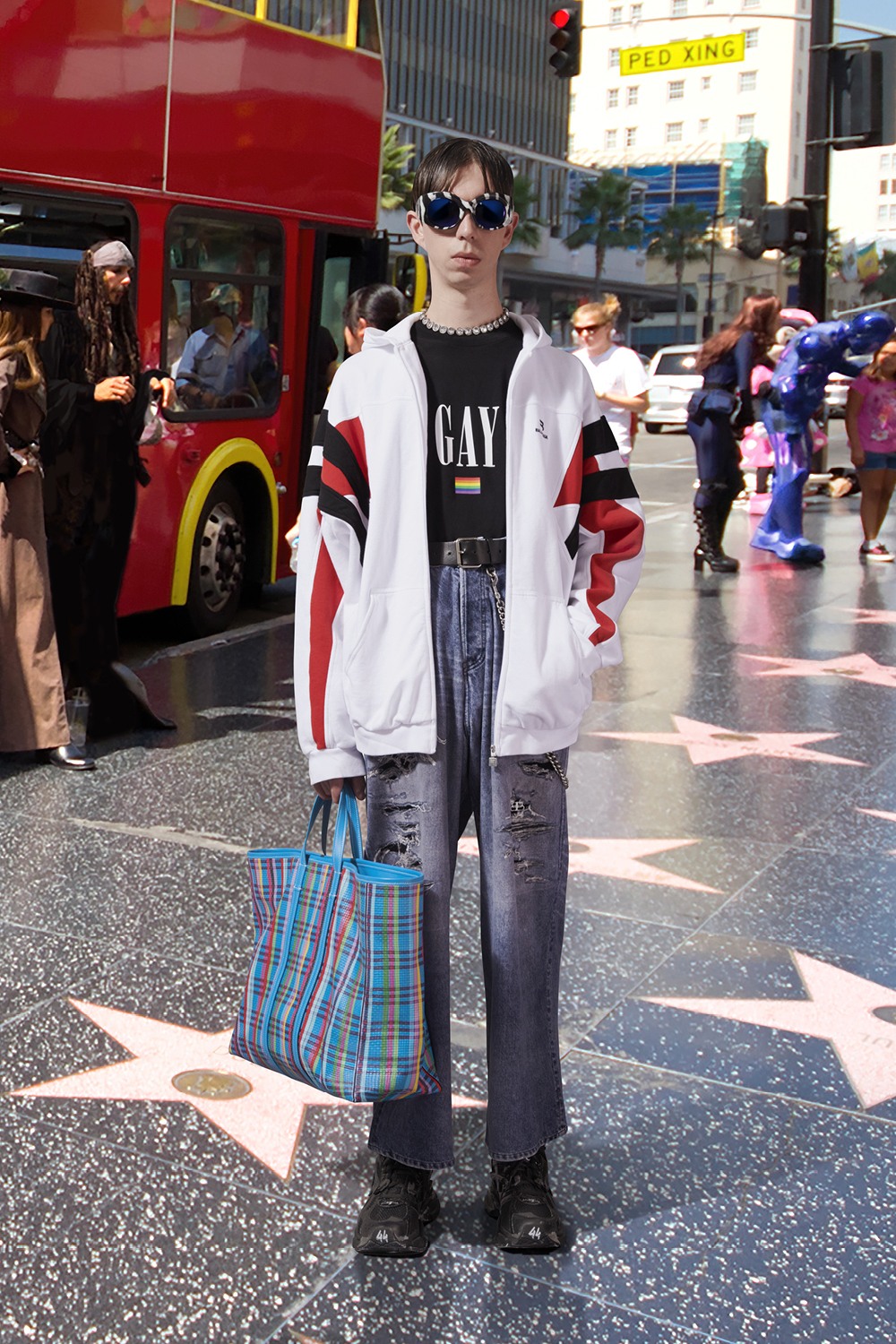 A model posing in a look from Balenciaga's Pride capsule