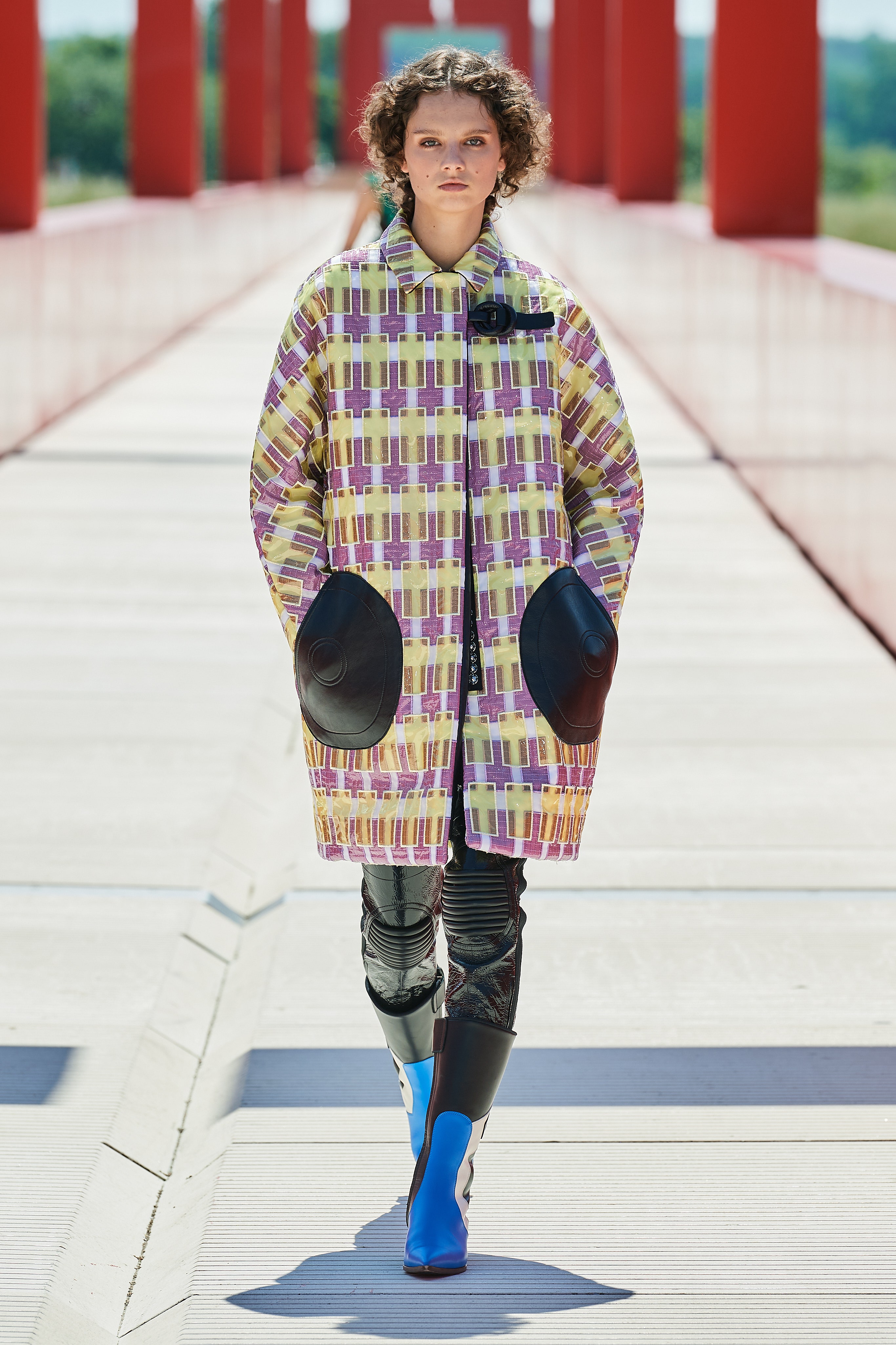 A model on the runway at Louis Vuitton Resort 2015 runway show