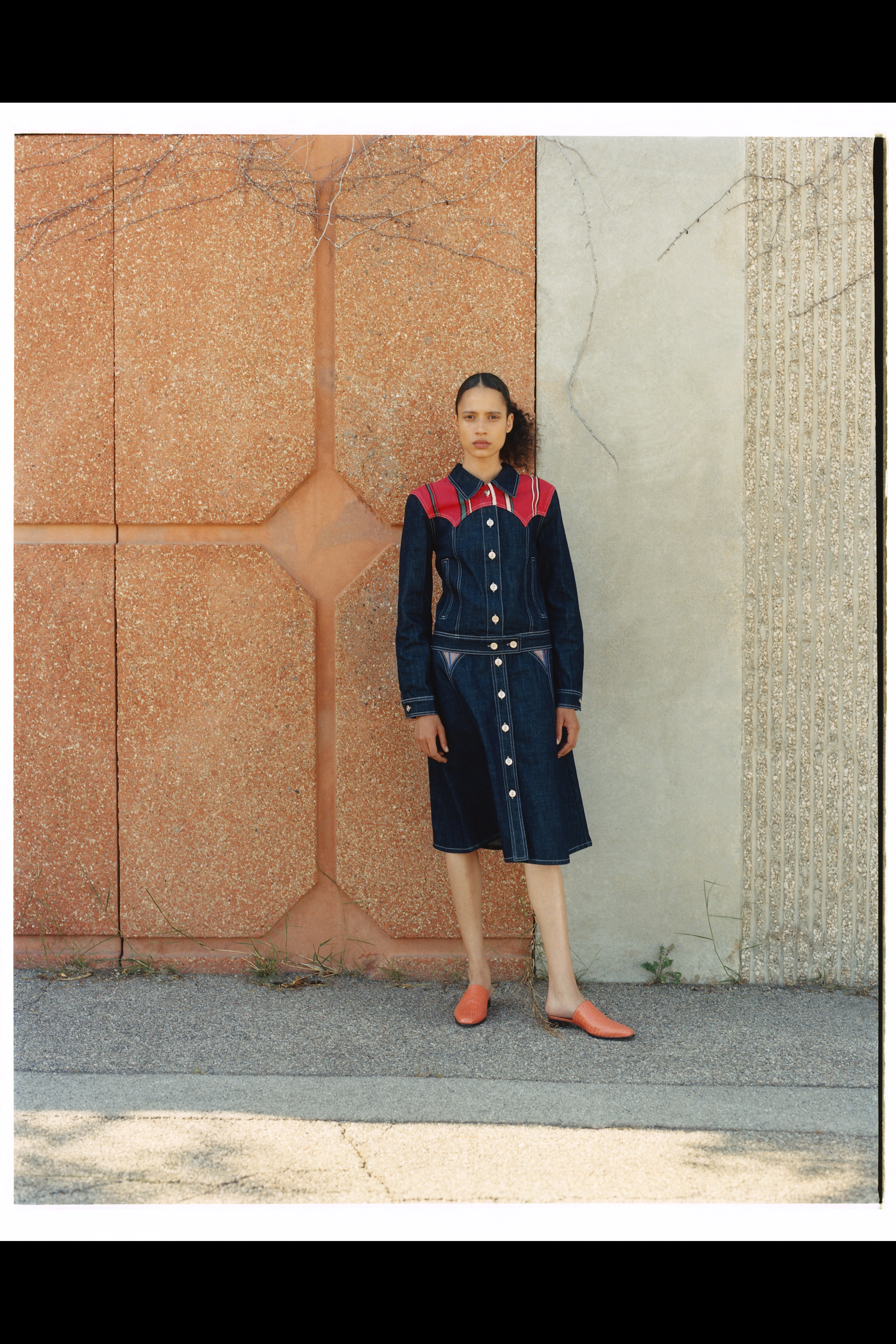 A model wearing a full look from Wales Bonner's SS22 collection 