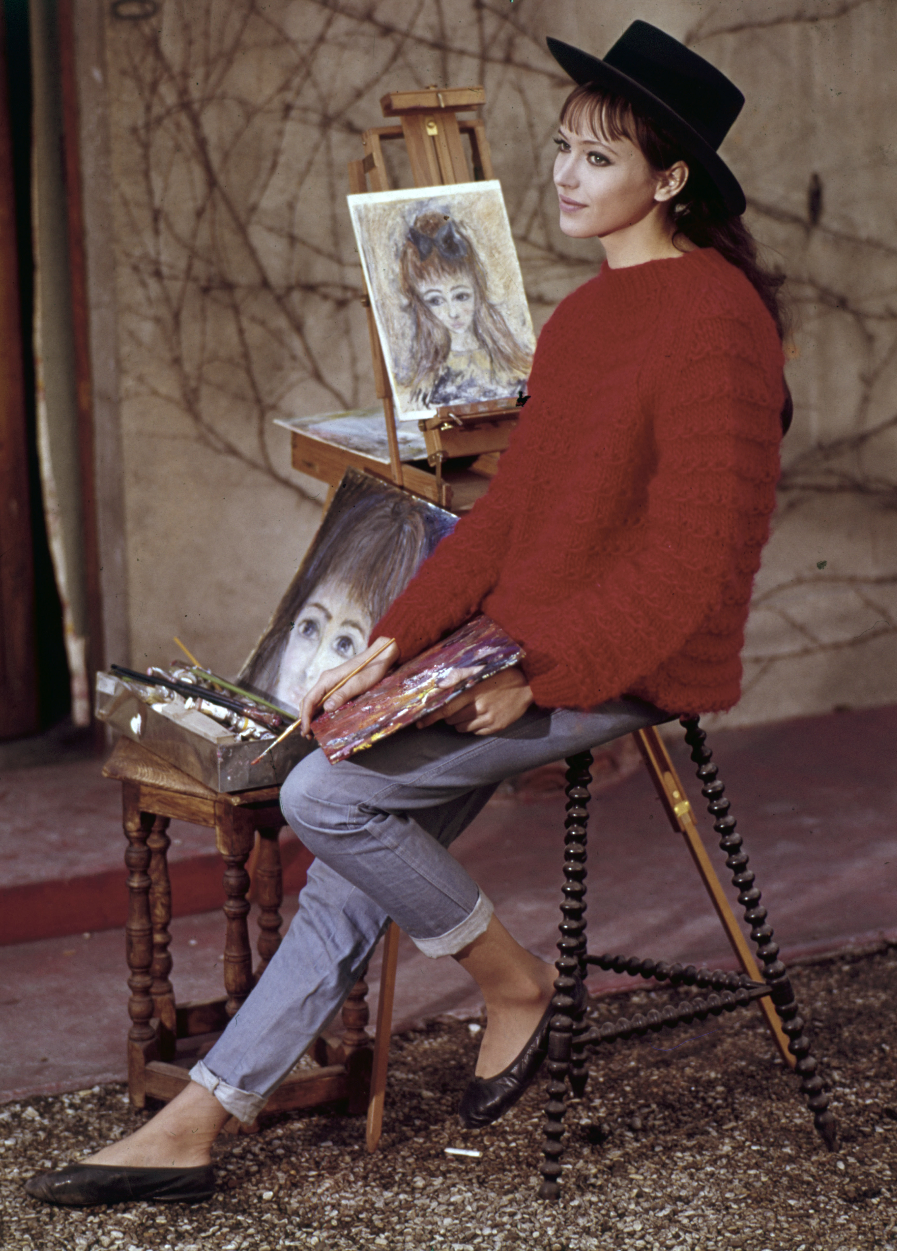 anna karina painting outside at her home in paris