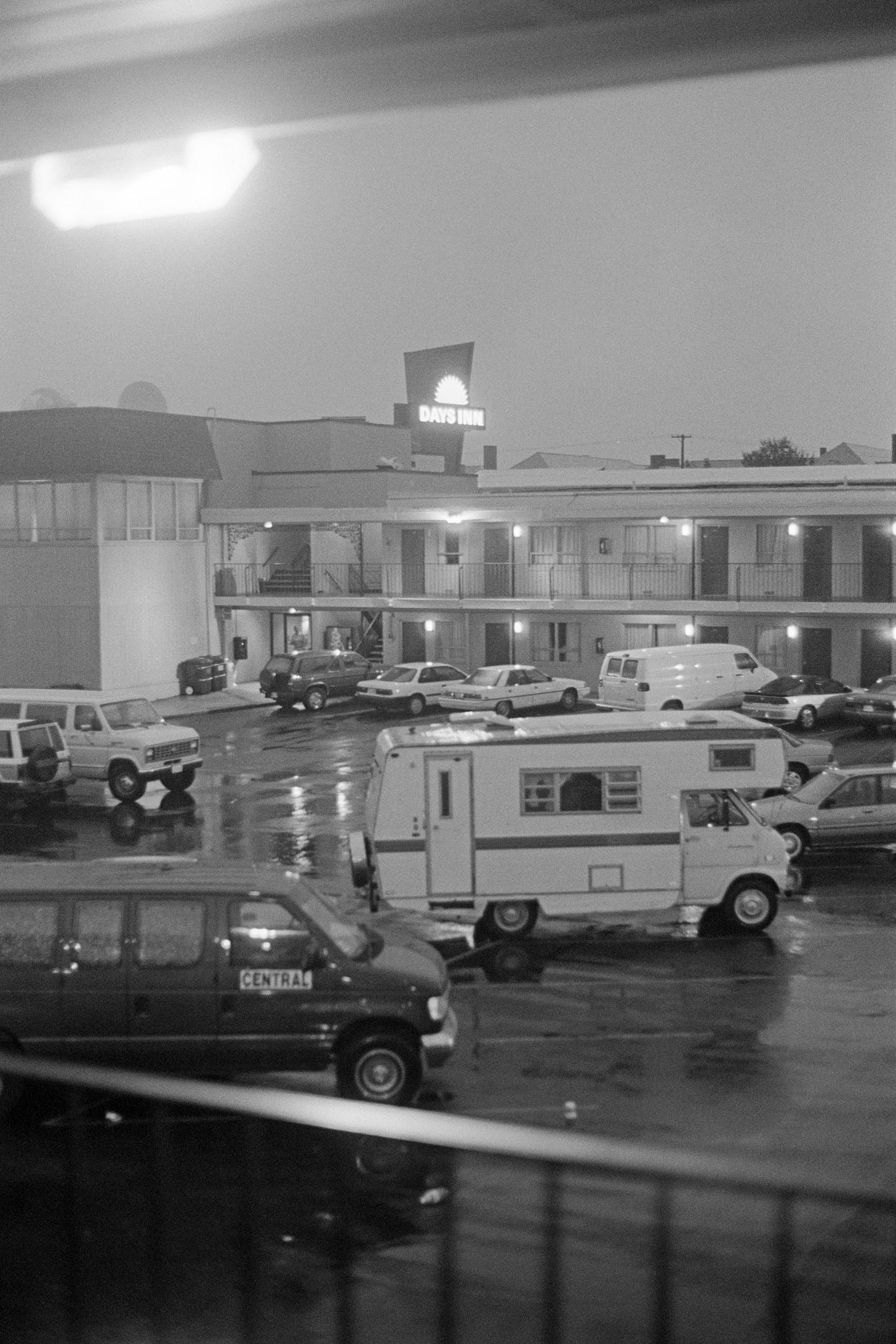 a rainy motel parking lot