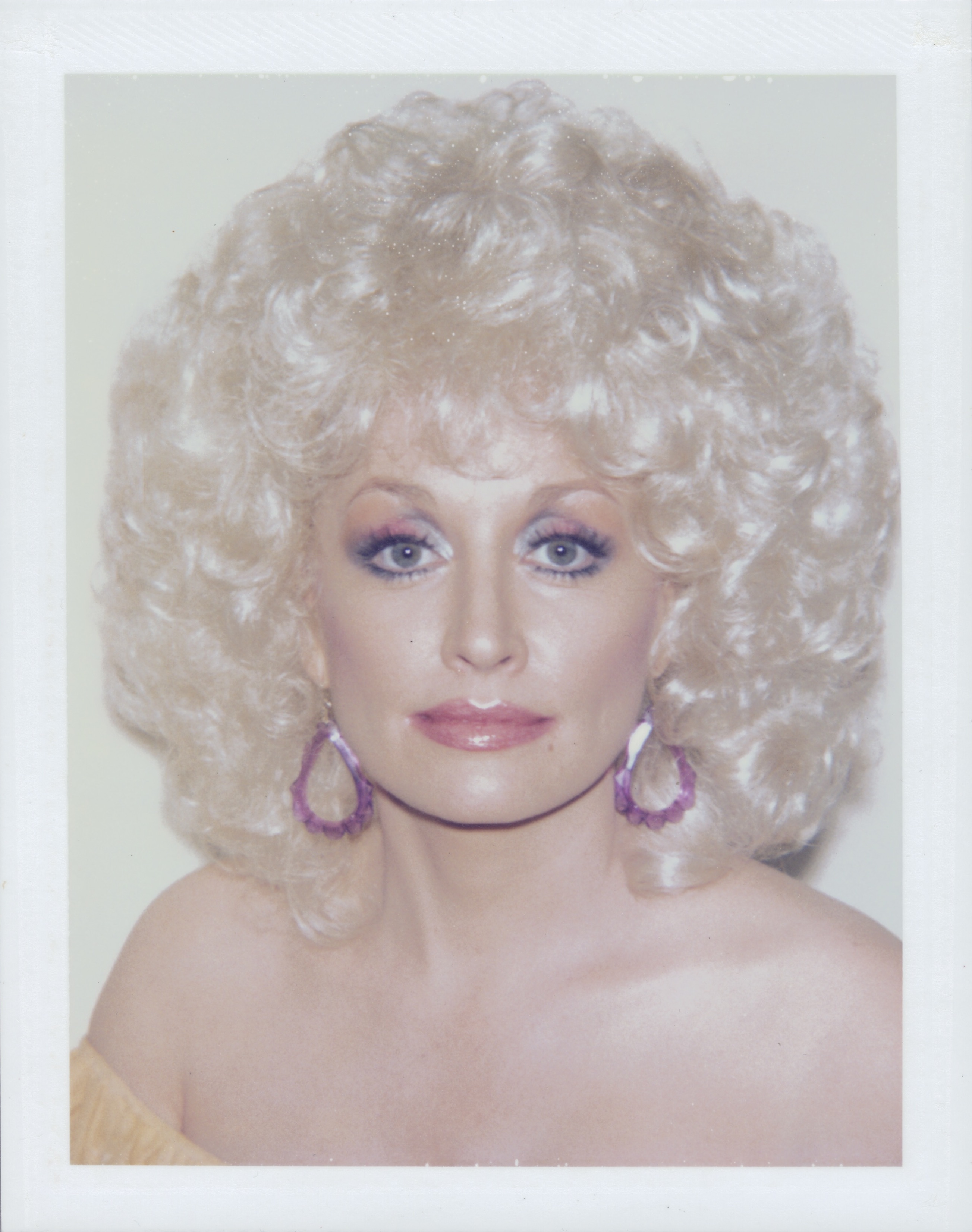 a polaraid of dolly parton by andy warhol