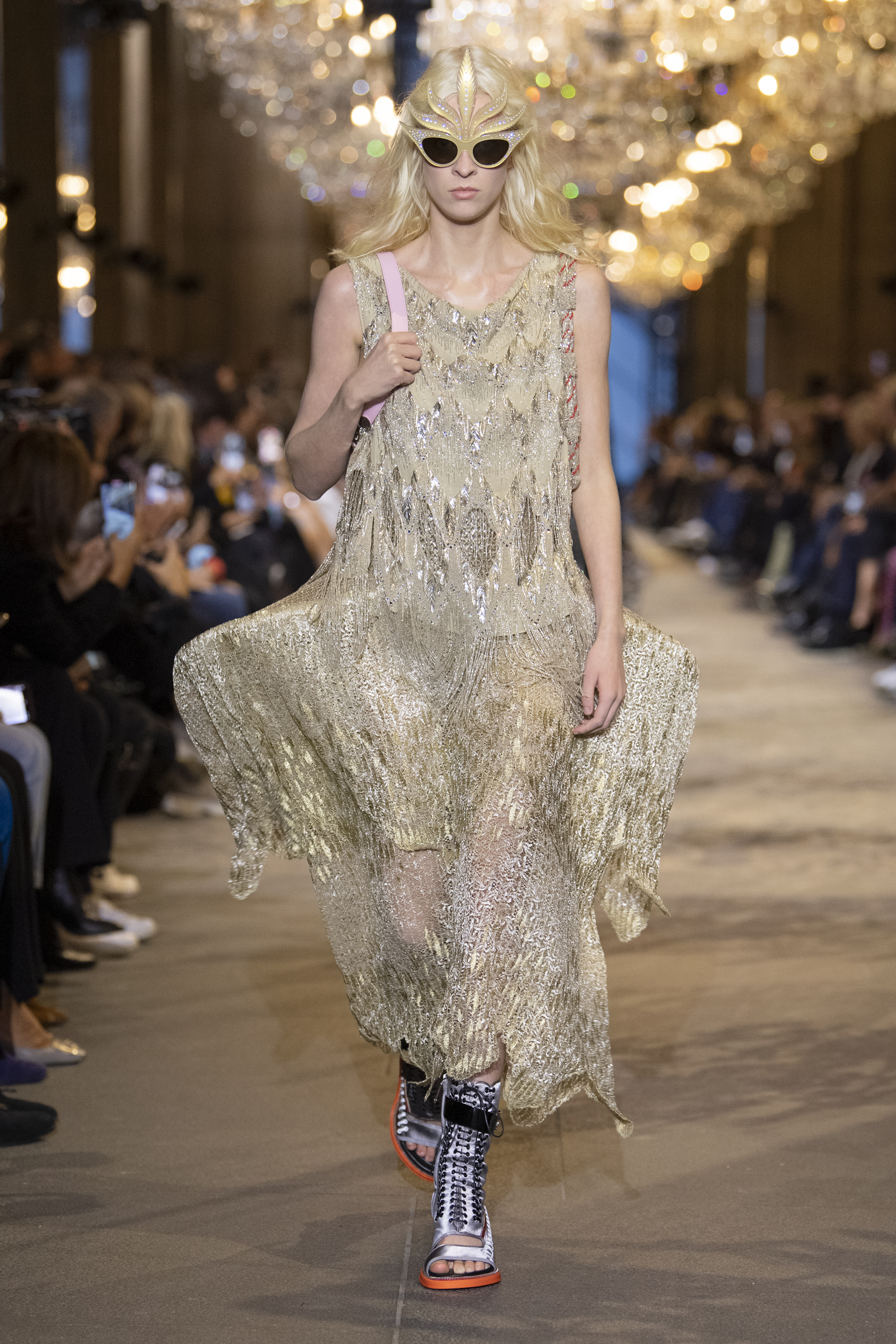 Protestor on Louis Vuitton SS22 Runway Show