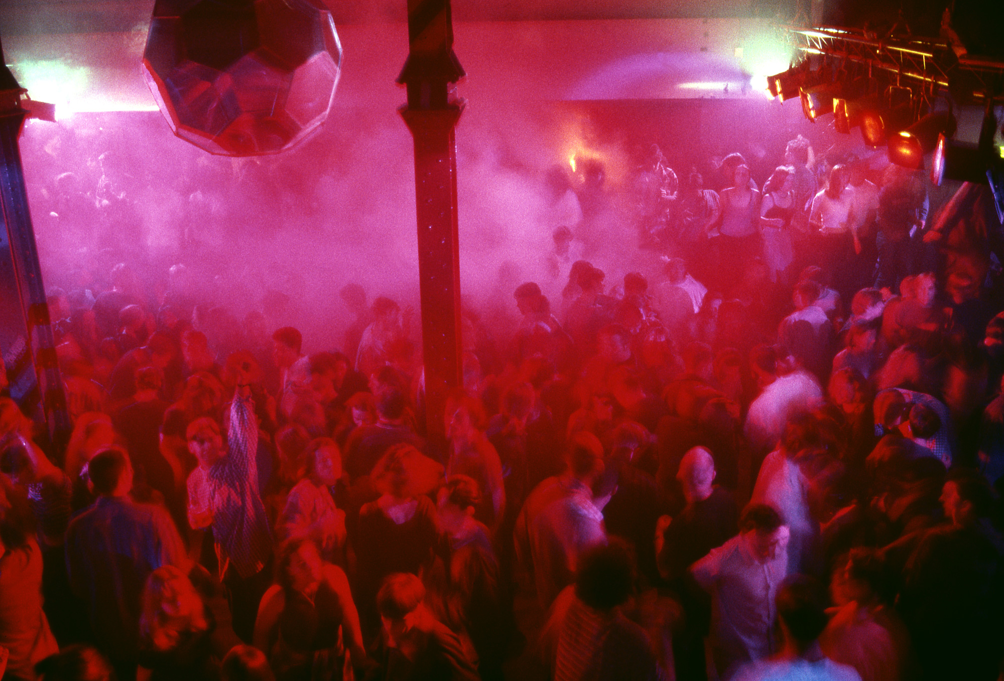 the hacienda dancefloor bathed in pink light