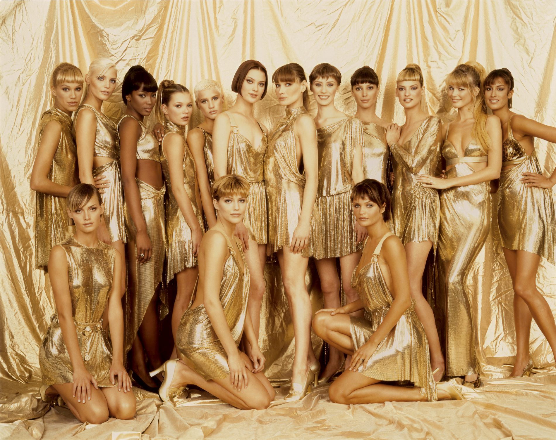 models in all gold backstage at versace rtw fall 1994 by doug ordway