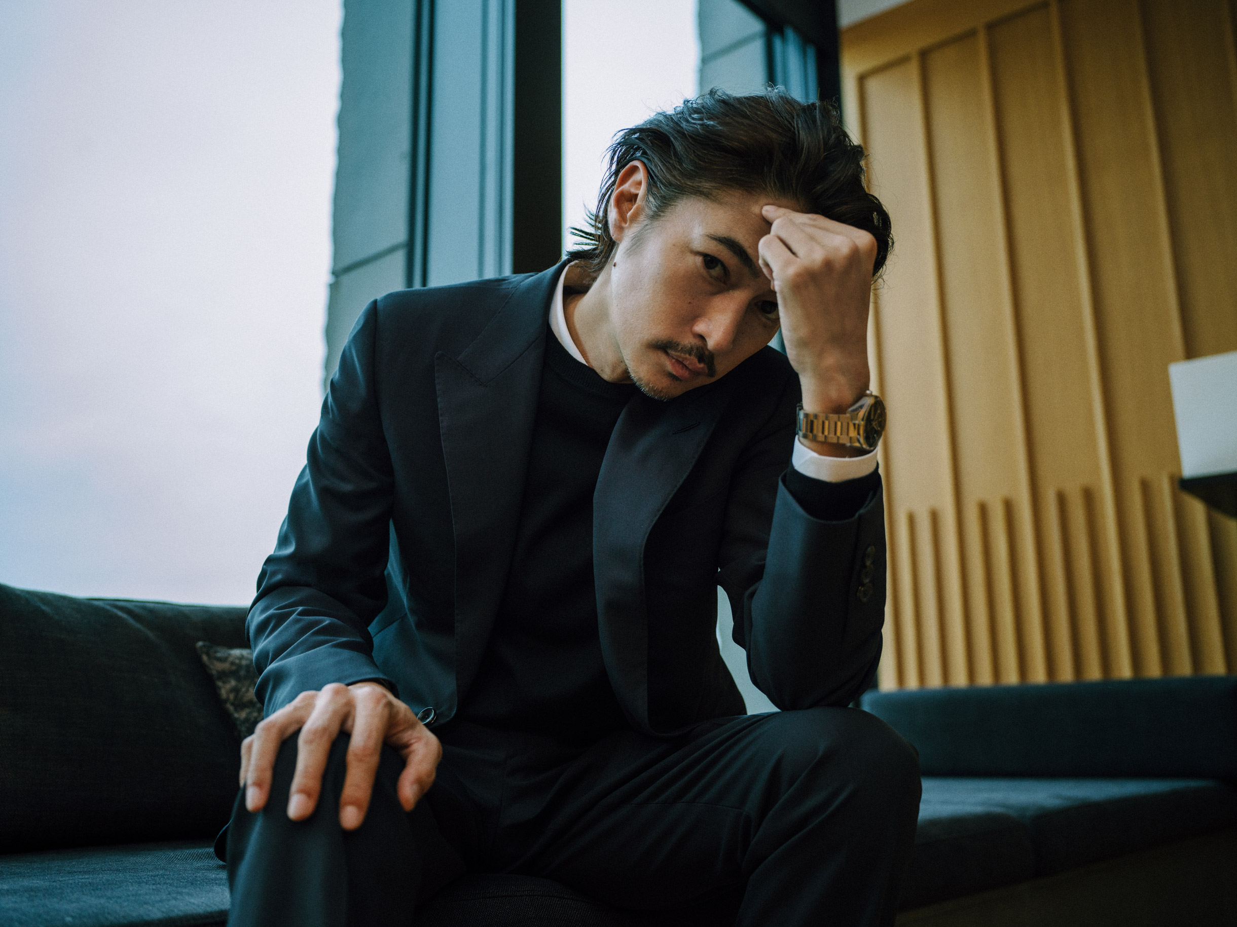 Yosuke Kubozuka wears Tag Heuer Carrera Calibre 5 Day-Date with blue dial
