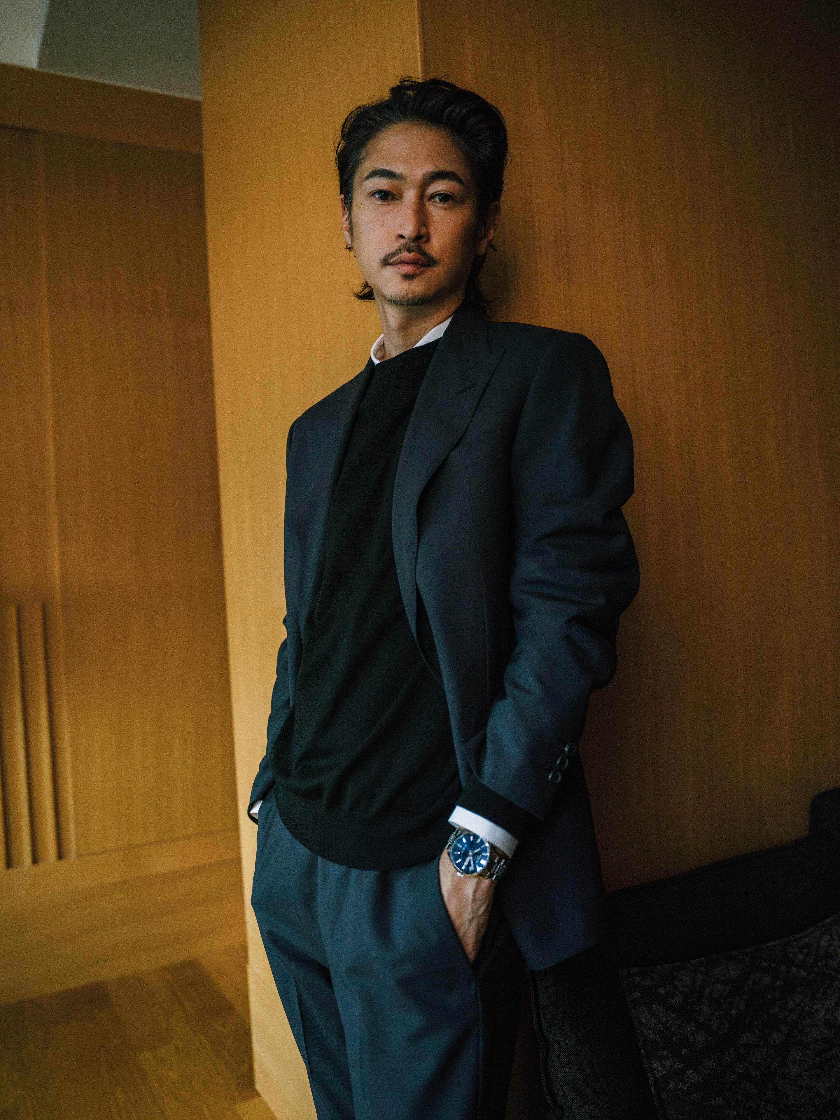 Yosuke Kubozuka wears Tag Heuer Carrera Calibre 5 Day-Date with blue dial