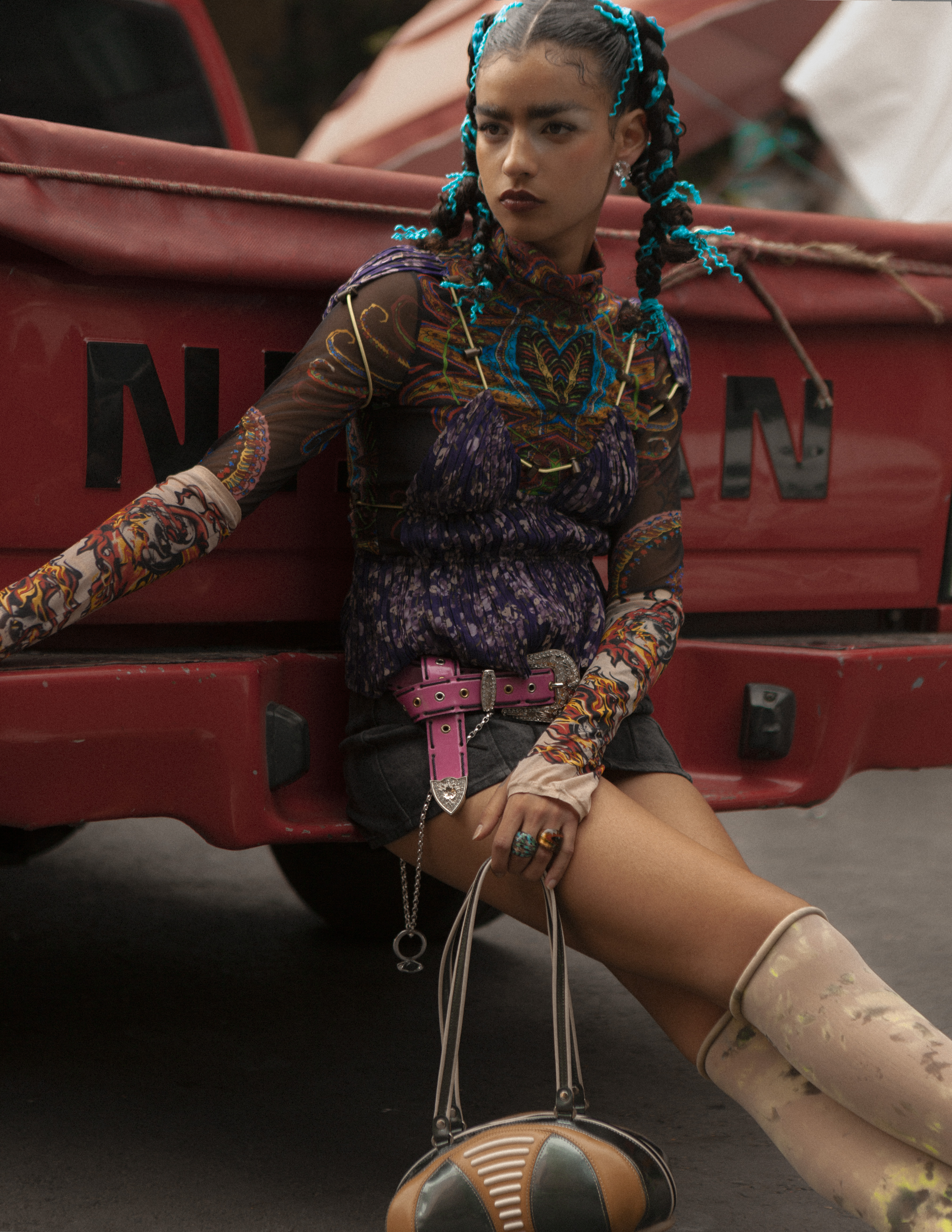 model maria gonzalez rojas posing on the back of a truck in mexico city